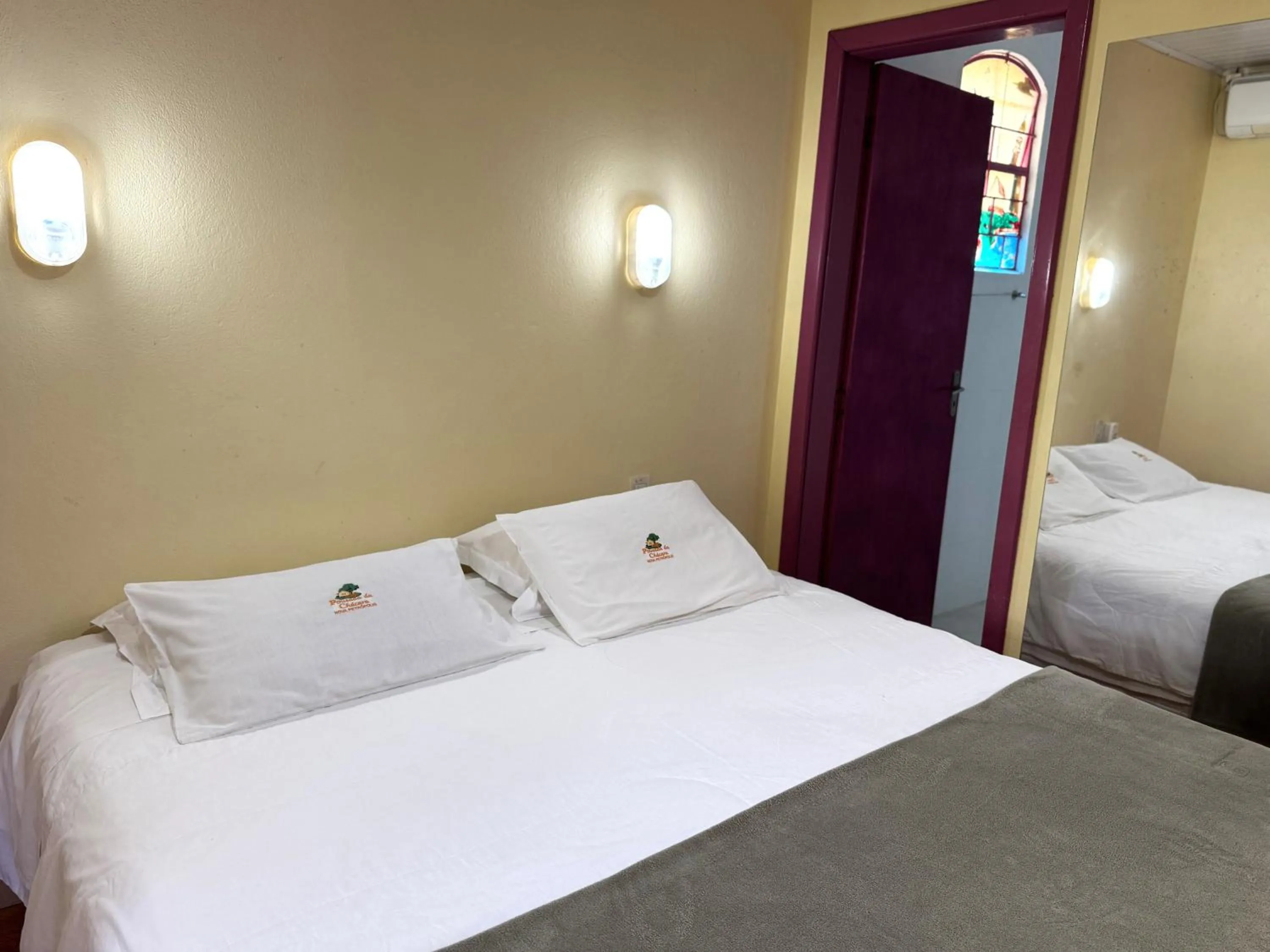 Bed in Pousada da Chacara