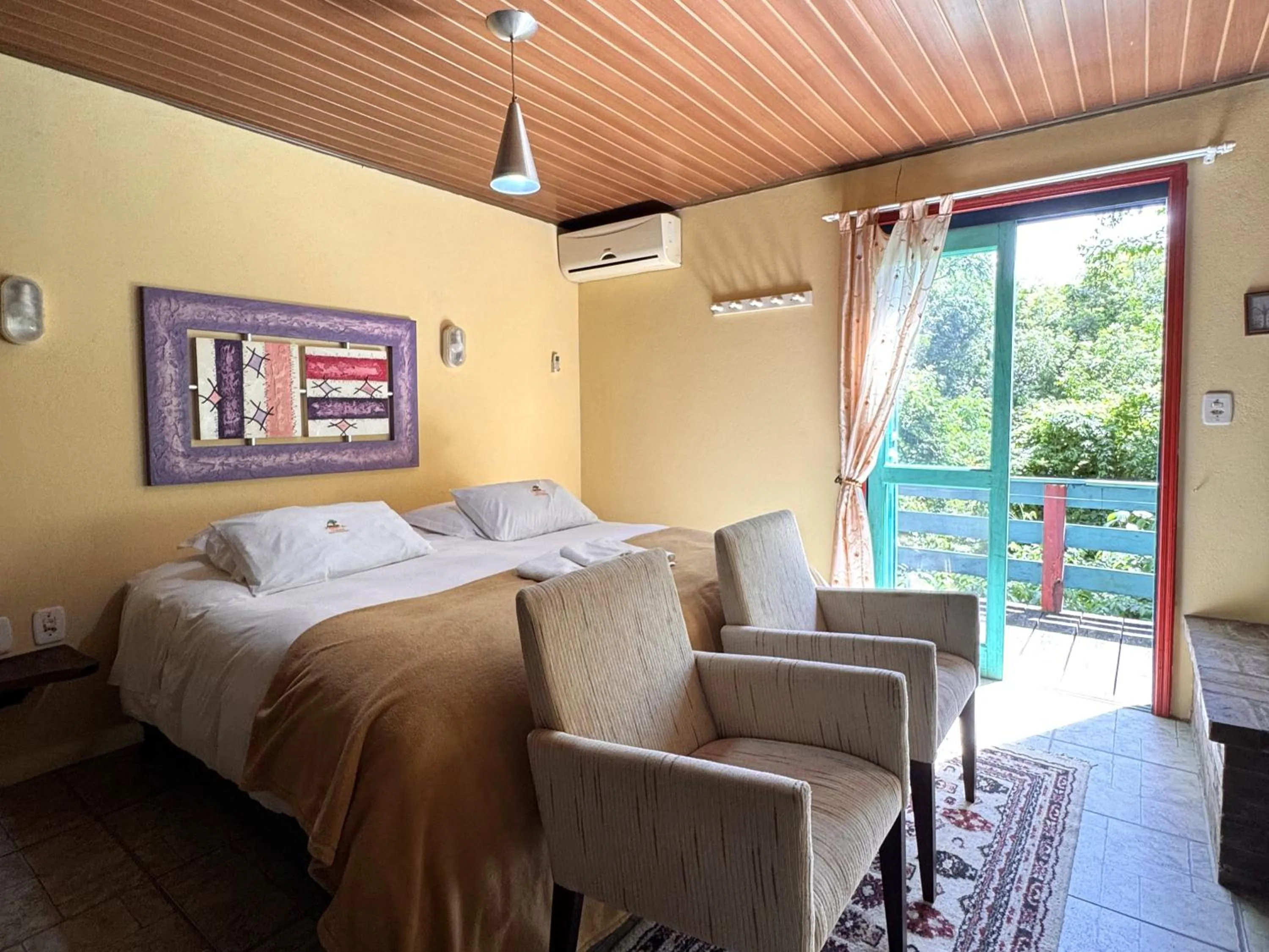 Bed in Pousada da Chacara