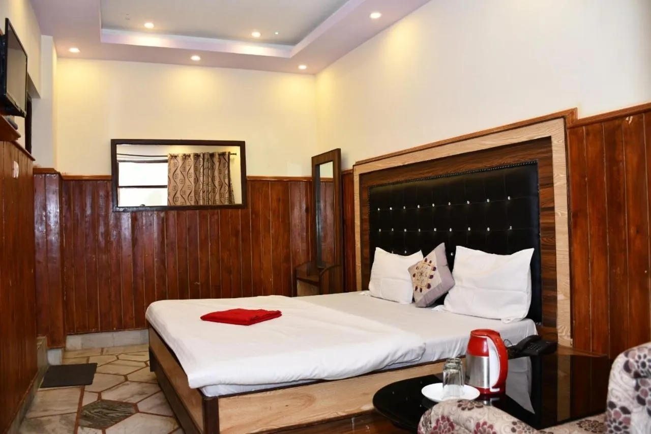 Bed in HOTEL HIMALYAN PARADISE