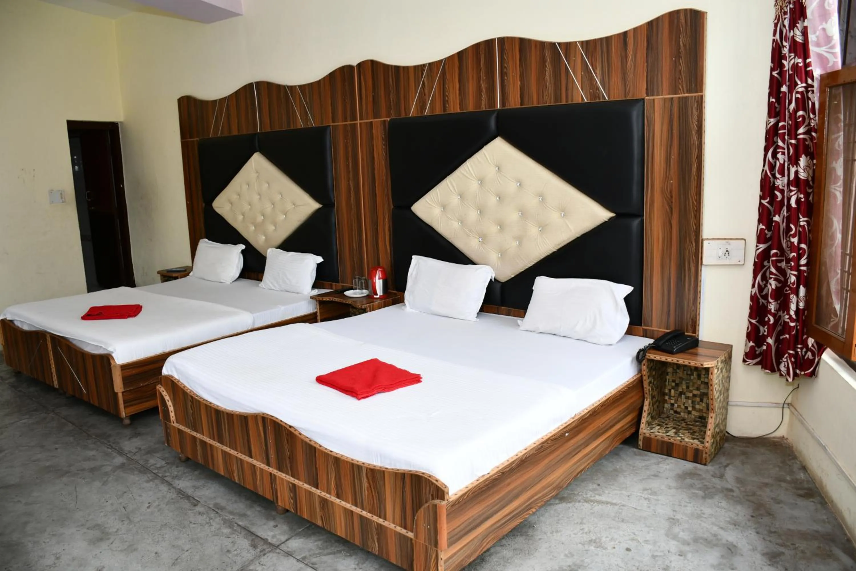 Bed in HOTEL HIMALYAN PARADISE