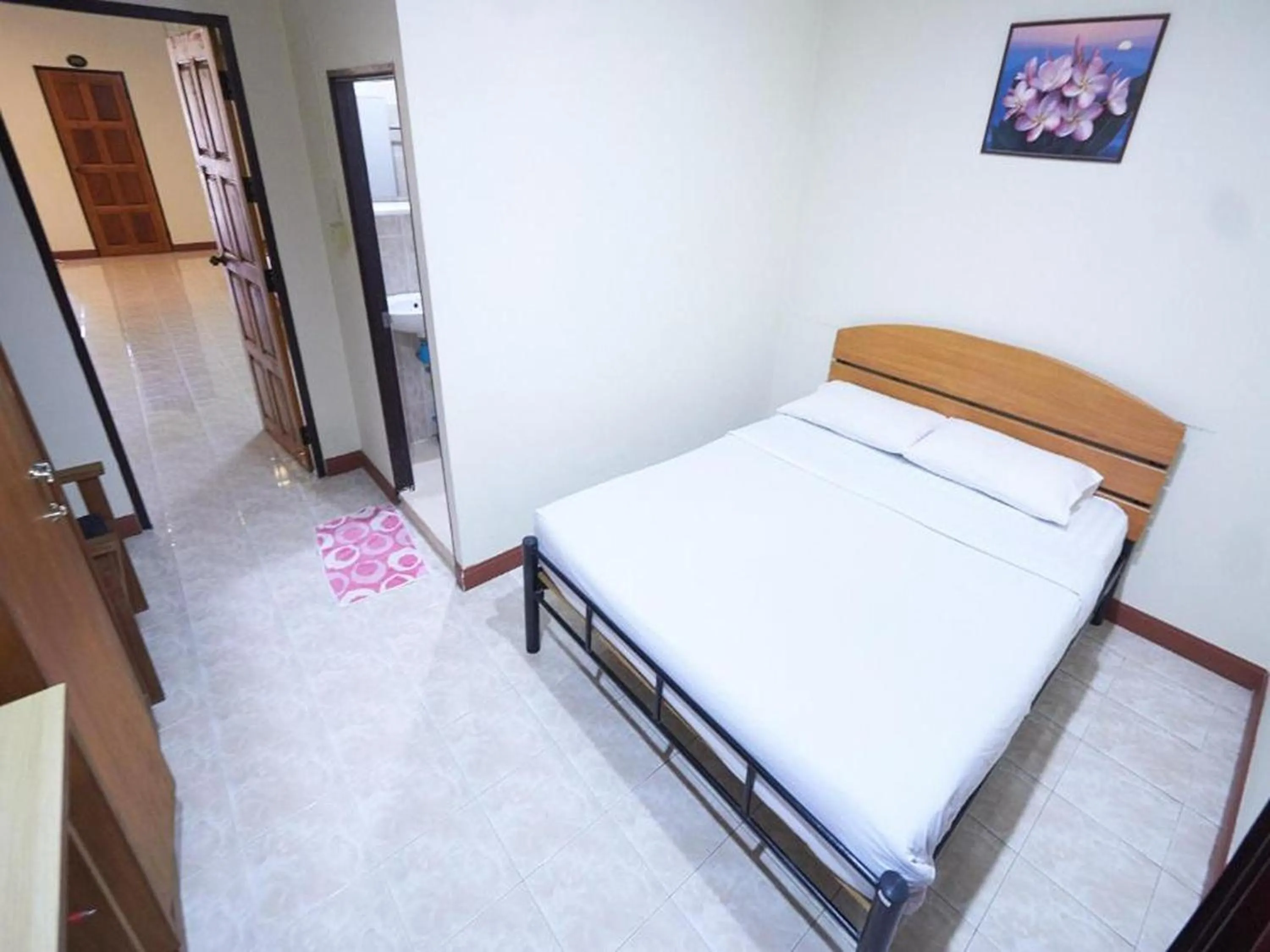 Bed in Toon Guesthouse Sukhothai