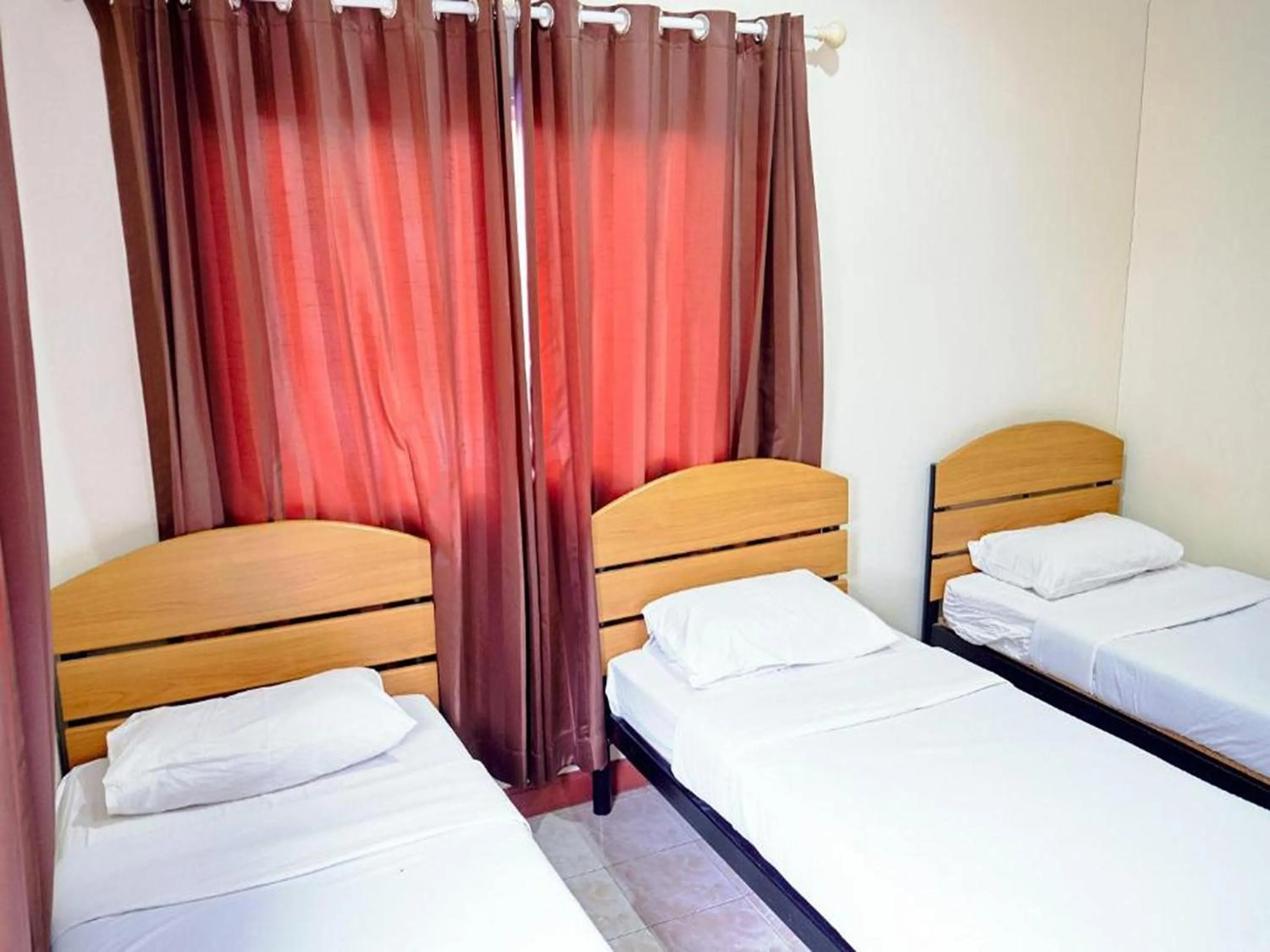 Bed in Toon Guesthouse Sukhothai