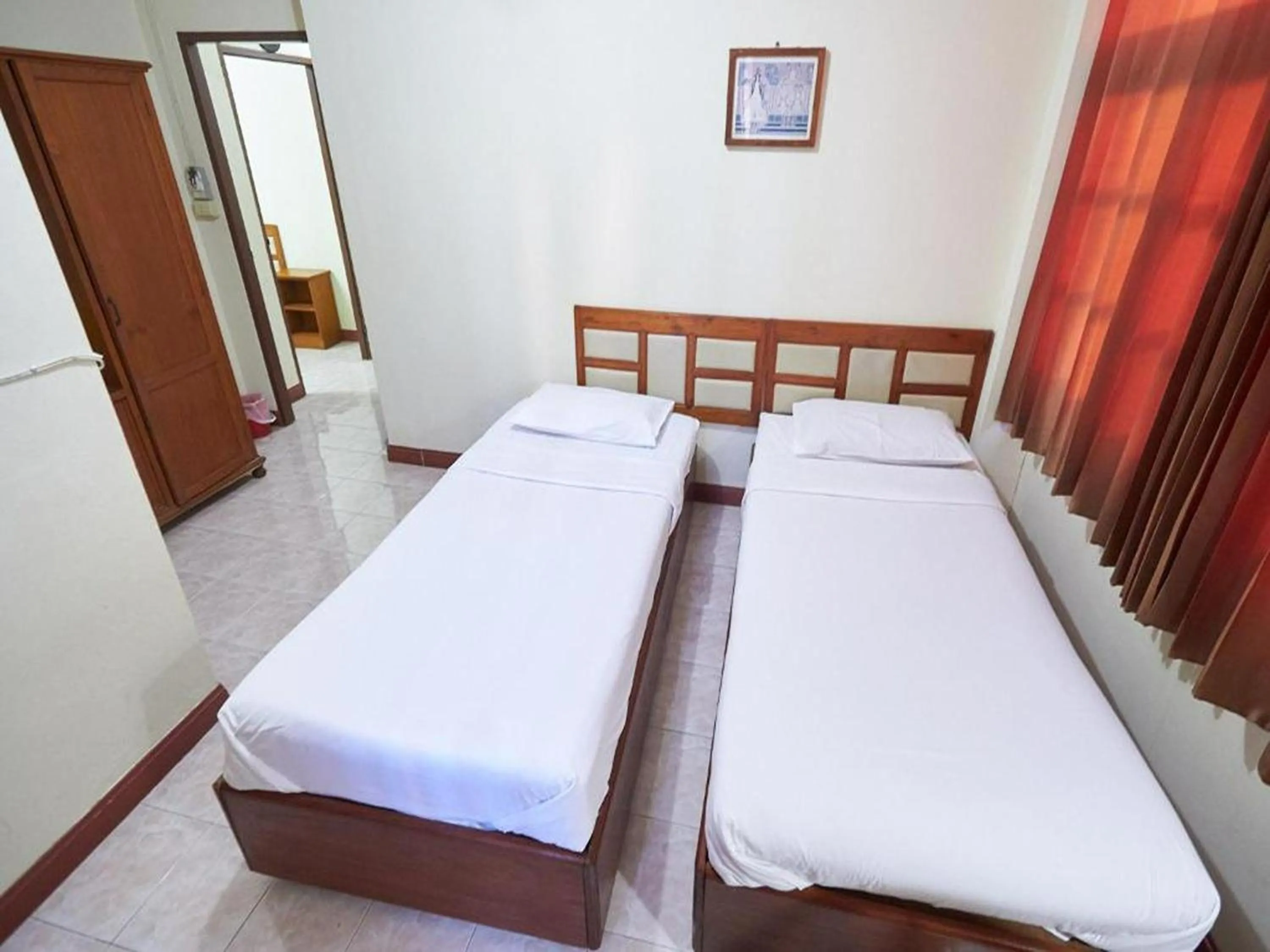 Bed in Toon Guesthouse Sukhothai