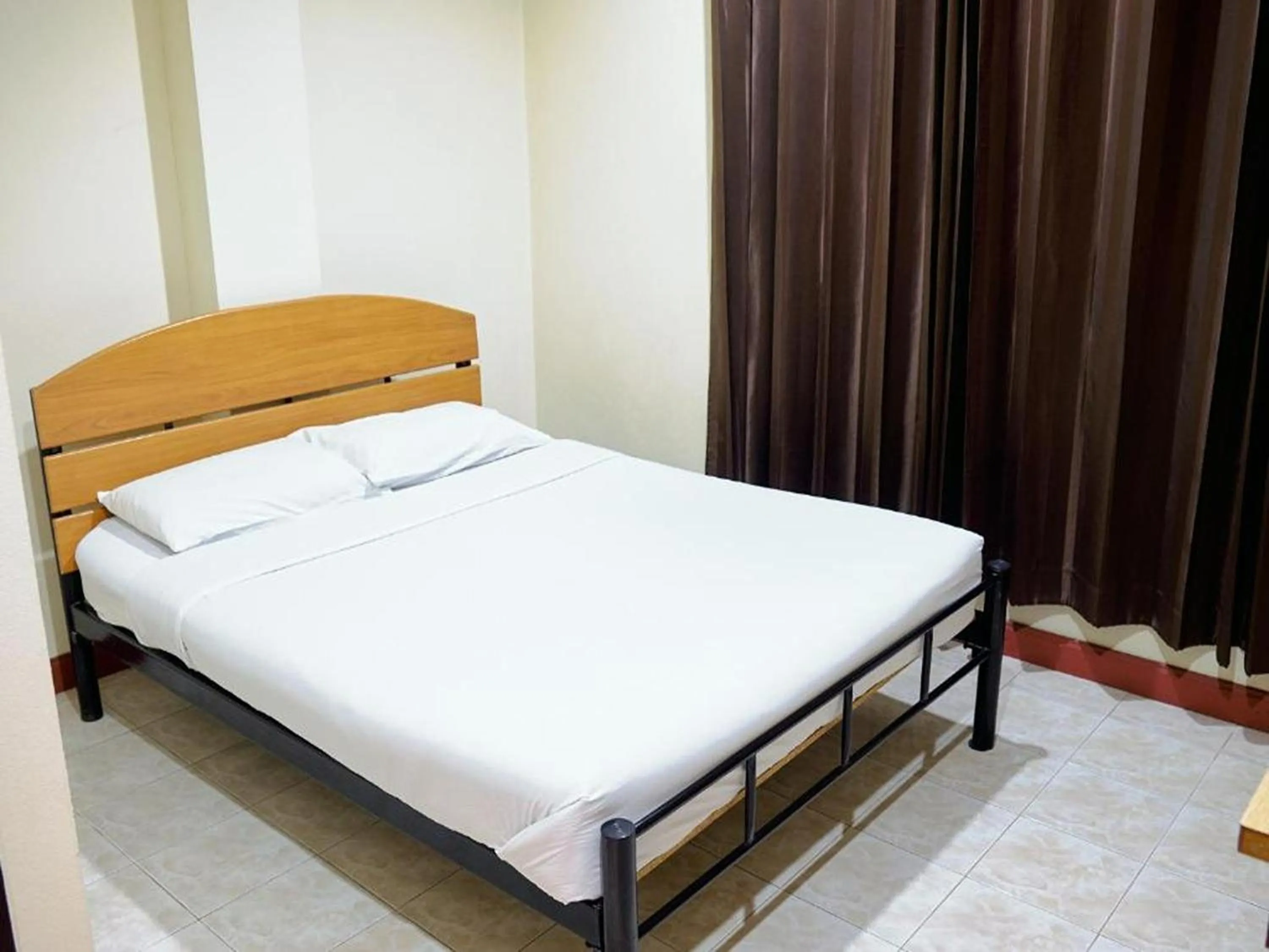 Bed in Toon Guesthouse Sukhothai