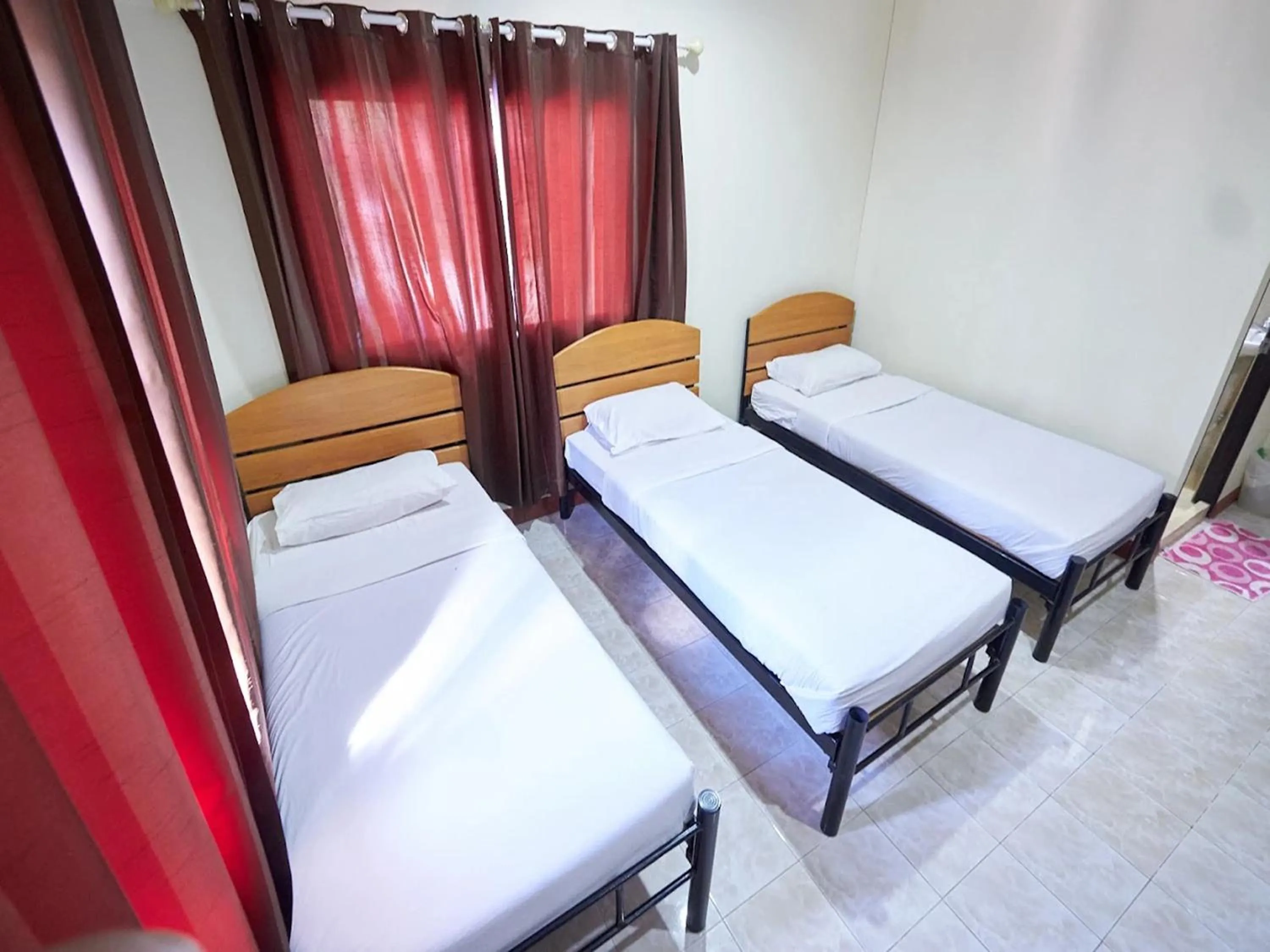 Bed in Toon Guesthouse Sukhothai
