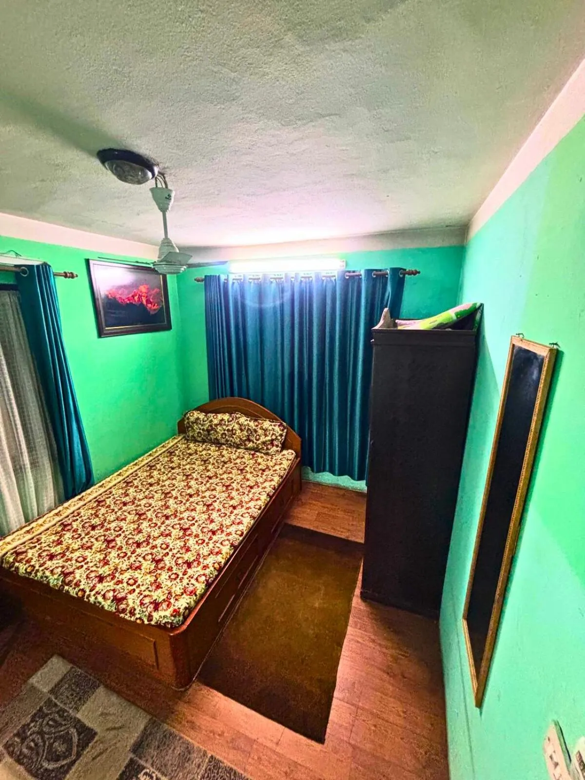 Bed in Deepjyoti Inn