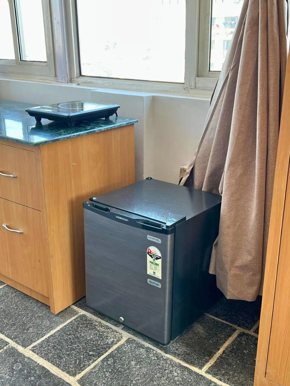 Kitchen or kitchenette in Deepjyoti Inn