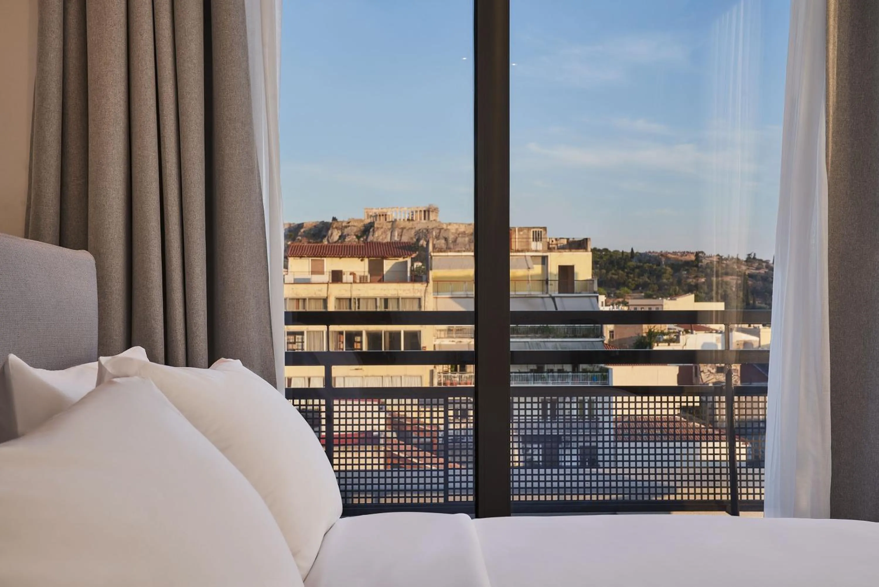 Landmark view, Bed in NLH KERAMEIKOS - Neighborhood Lifestyle Hotels
