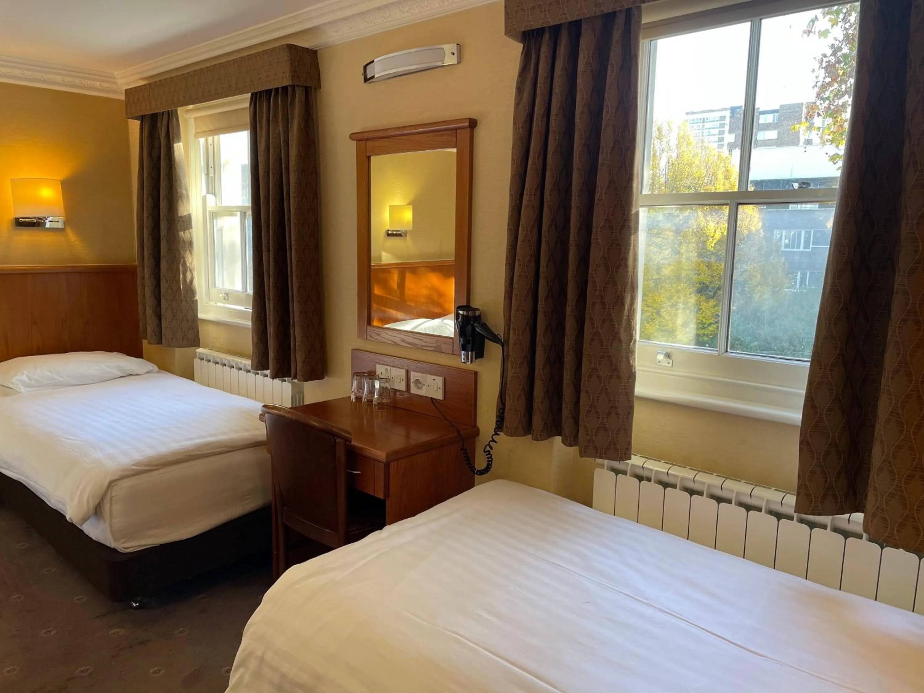 Bed in Orchard Hotel