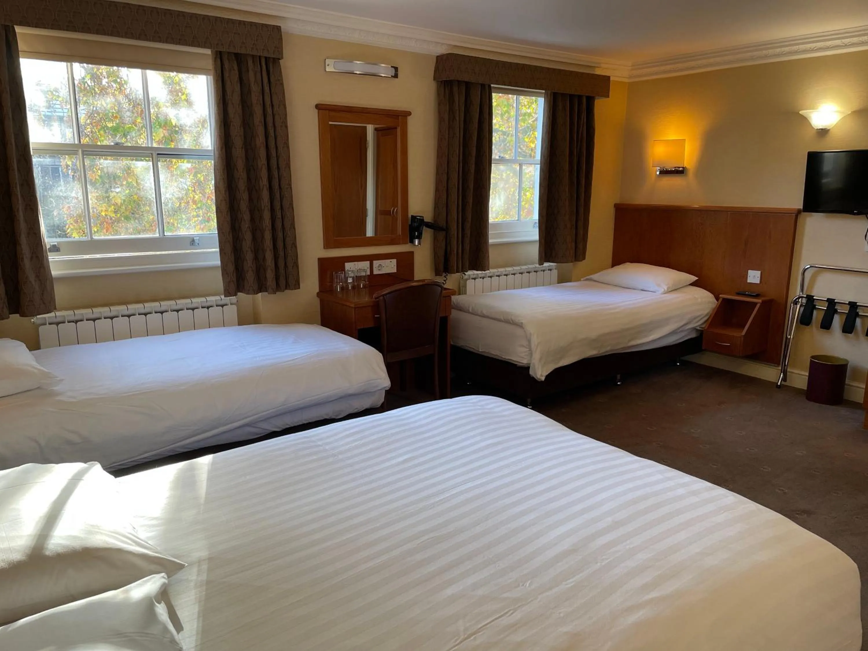 Bed in Orchard Hotel