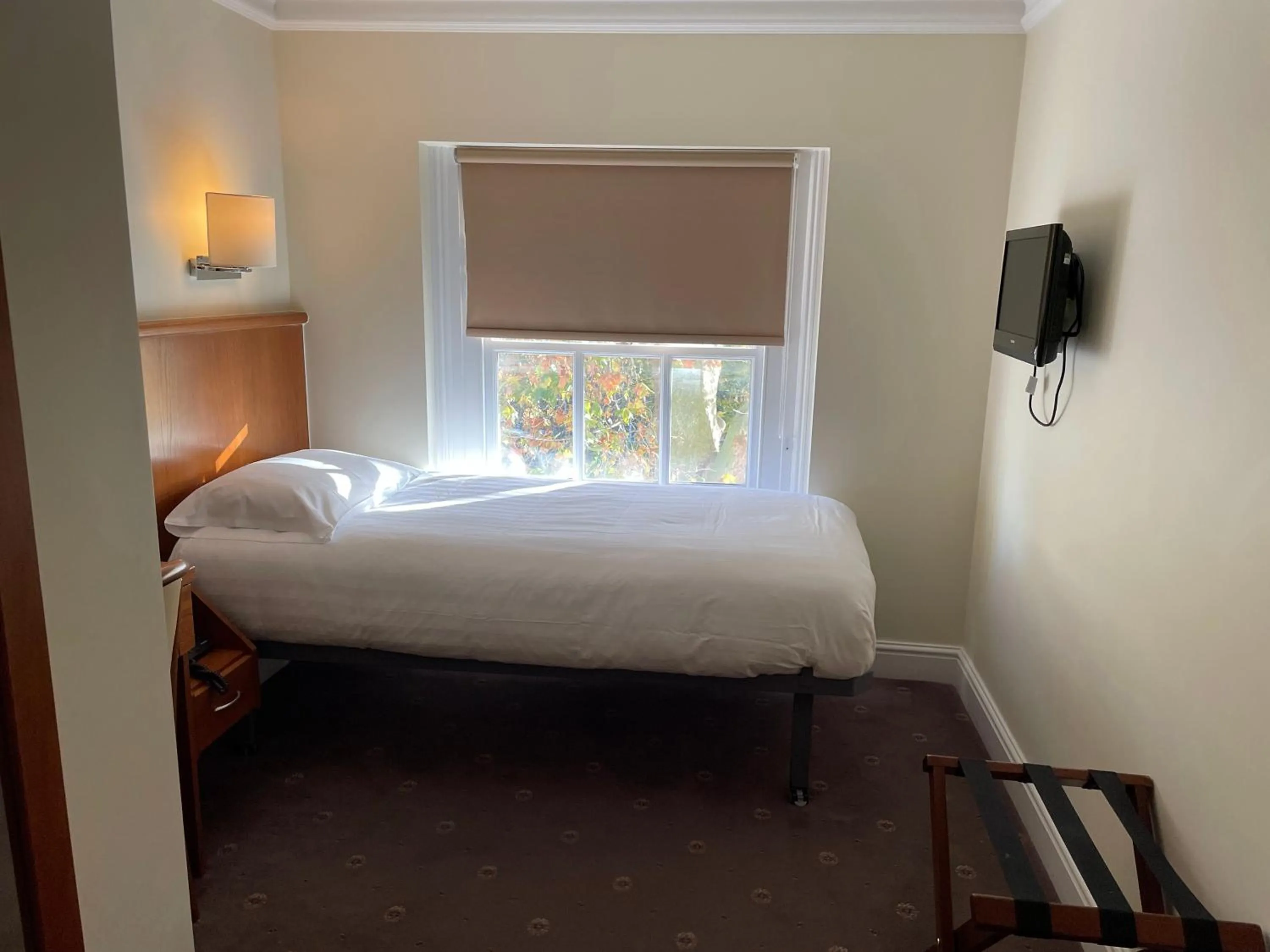 Bed in Orchard Hotel