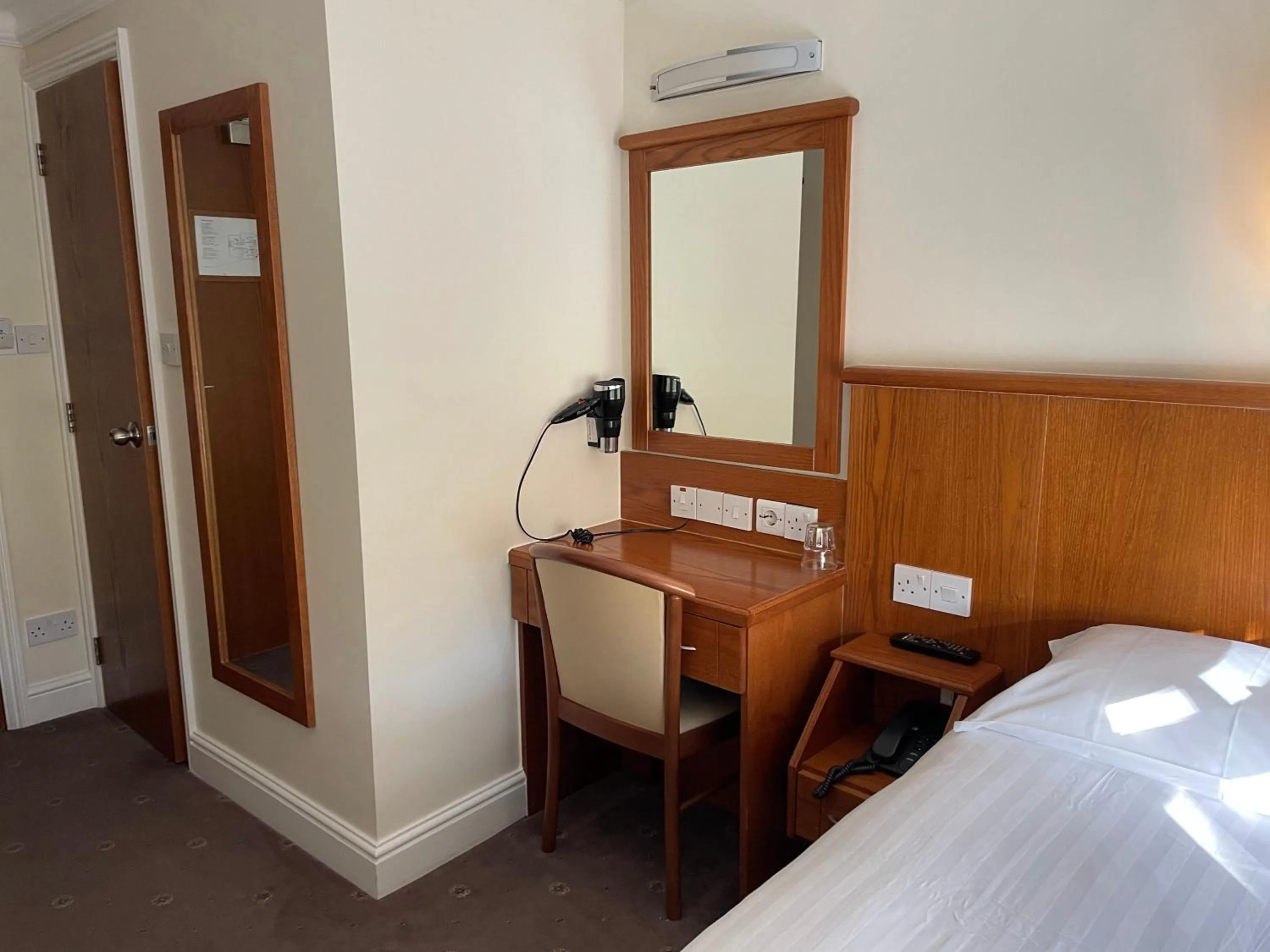 Bed in Orchard Hotel