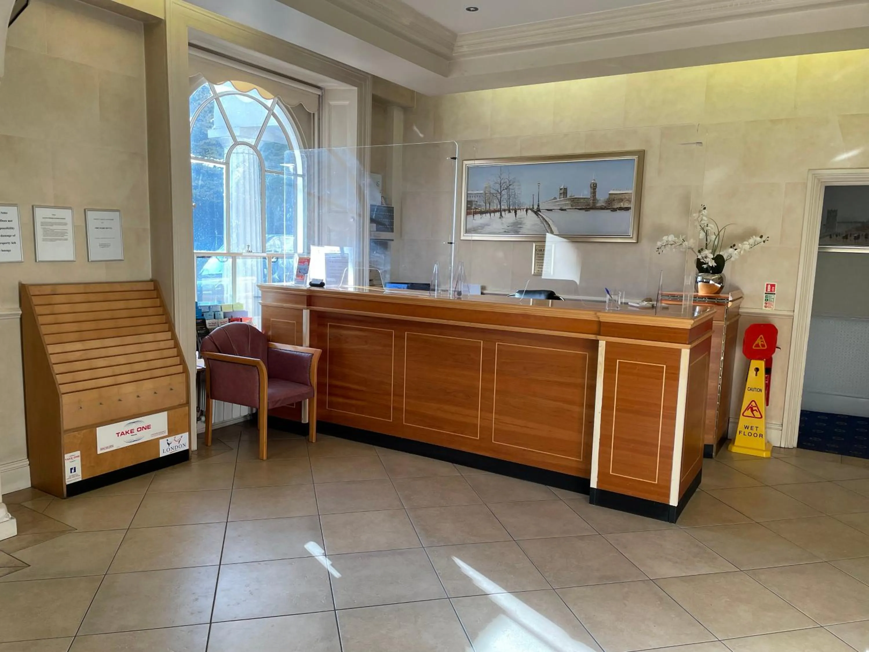 Lobby or reception in Orchard Hotel