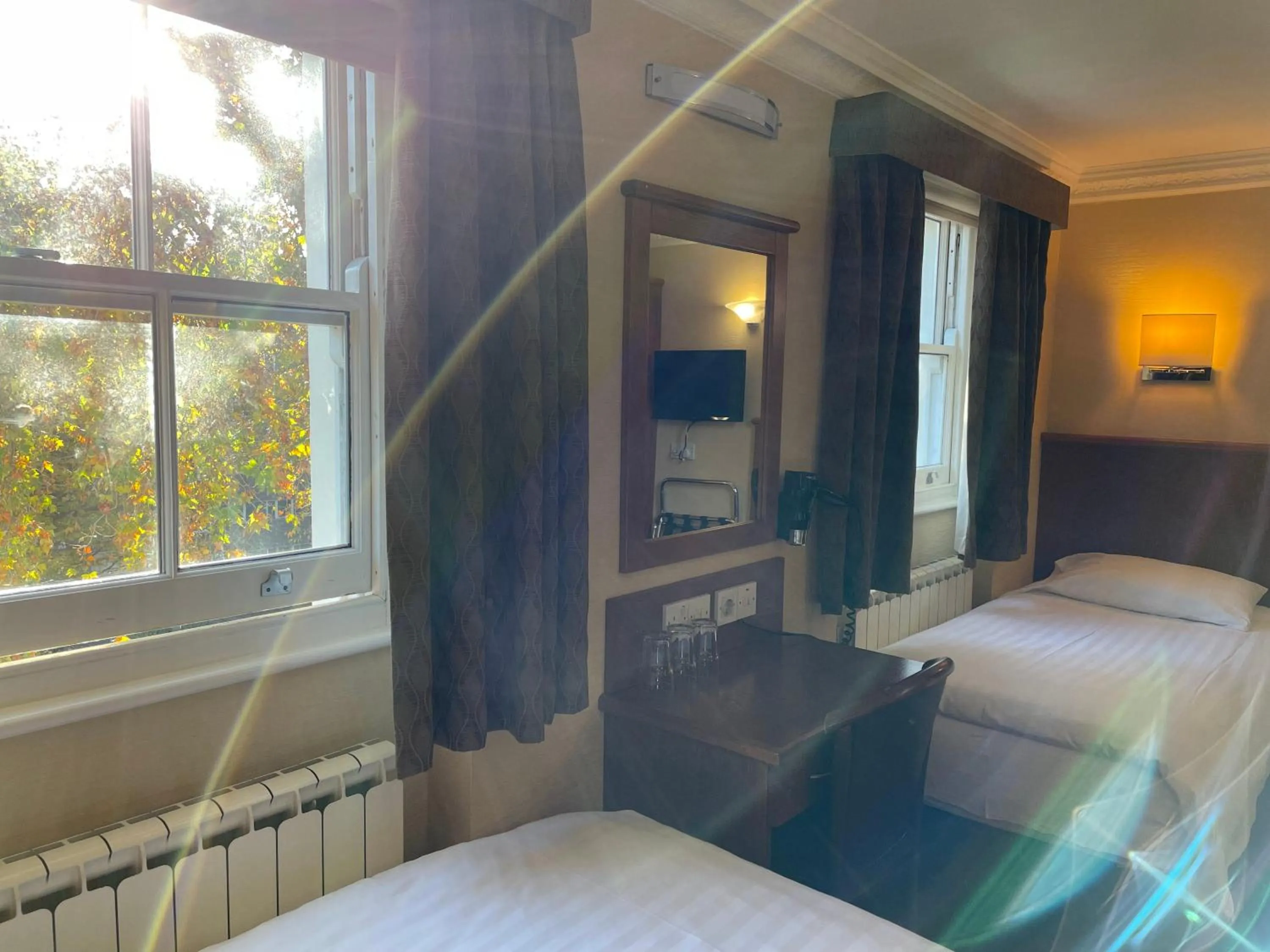 Bed in Orchard Hotel