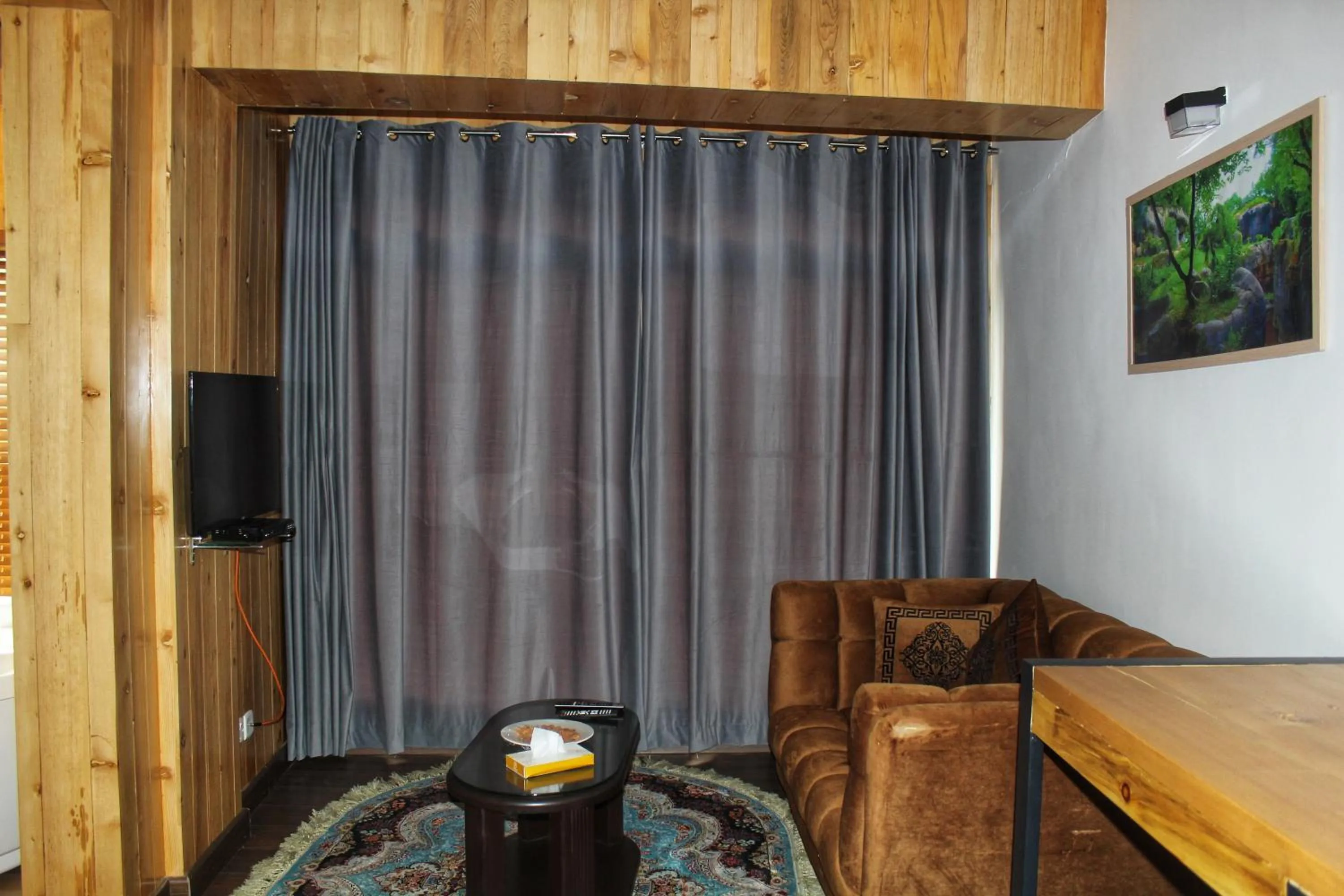 Communal lounge/ TV room in Famree Resort Hunza
