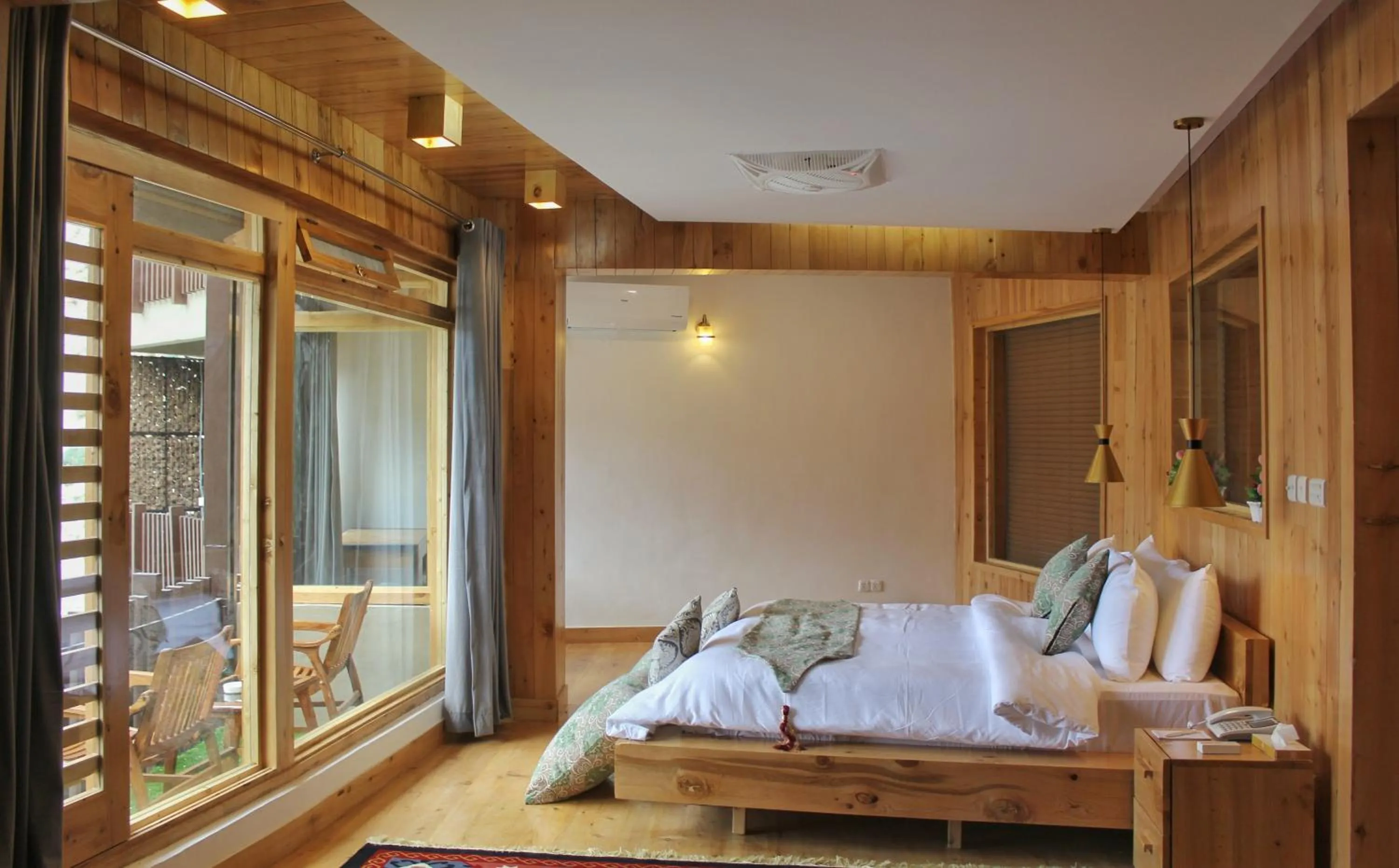 Photo of the whole room, Bed in Famree Resort Hunza