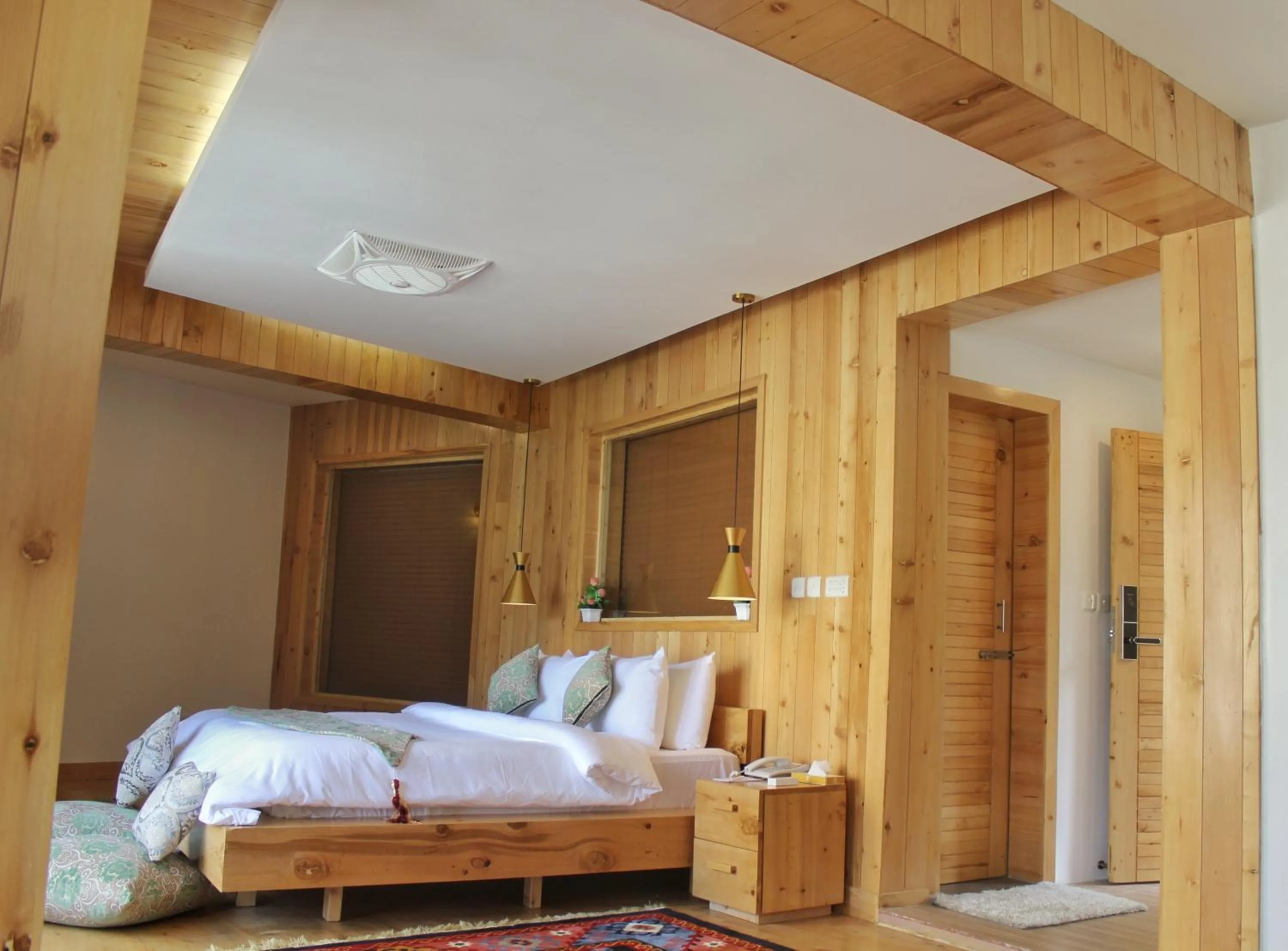 Photo of the whole room, Bed in Famree Resort Hunza