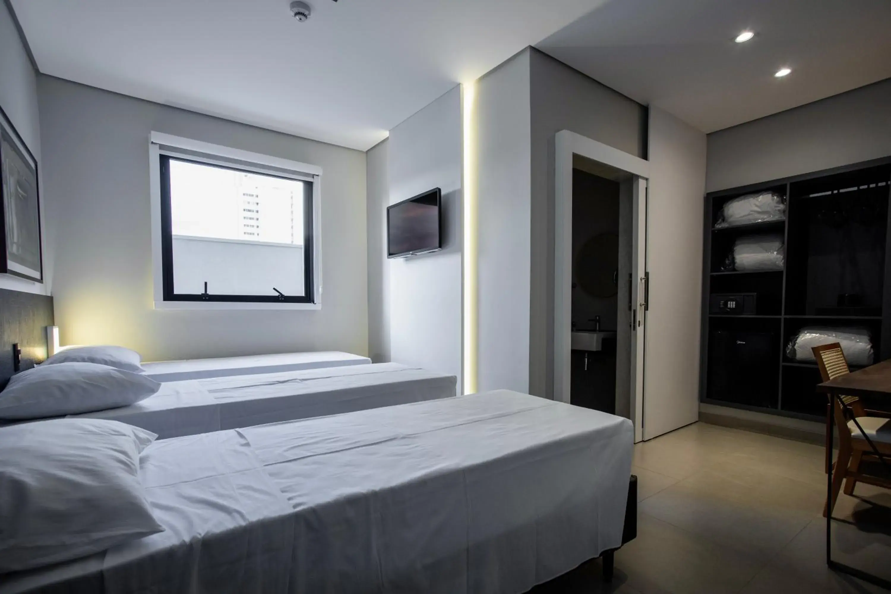 Bed in LA HOTEL VOTUPORANGA Bed in LA HOTEL VOTUPORANGA