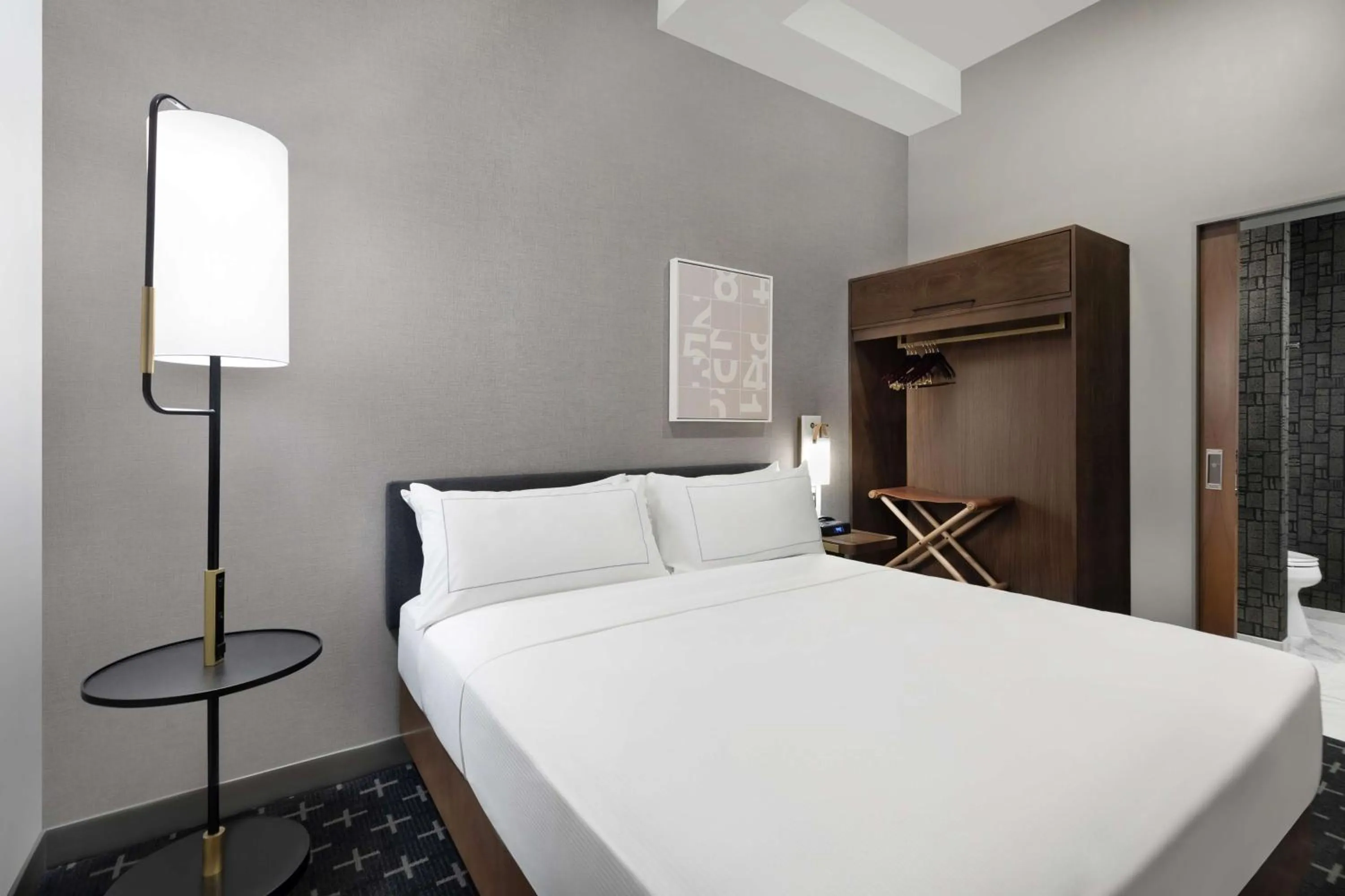 Bed in The Slate Hotel Denver Downtown, Tapestry by Hilton