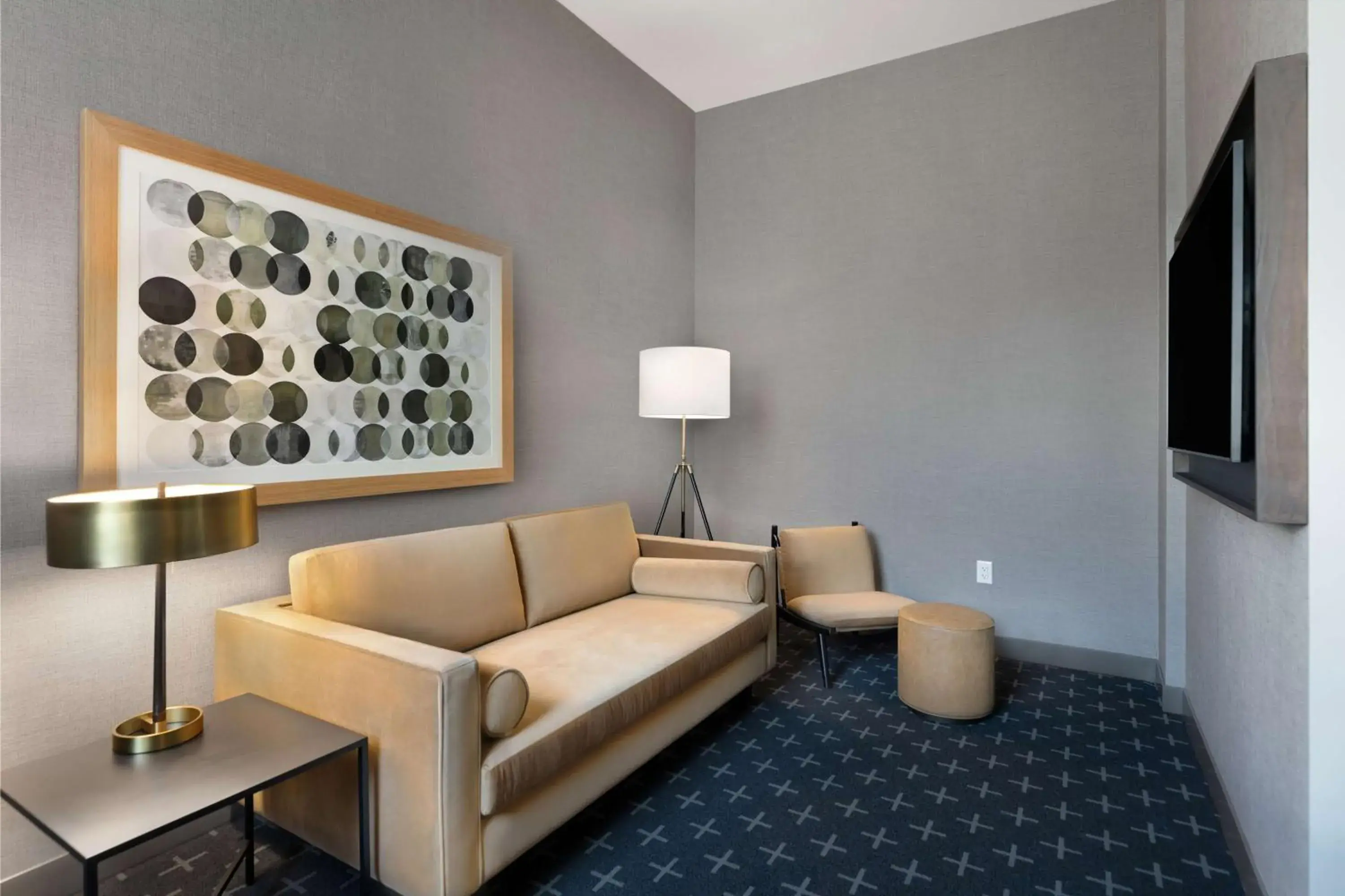 Living room in The Slate Hotel Denver Downtown, Tapestry by Hilton Living room in The Slate Hotel Denver Downtown, Tapestry by Hilton