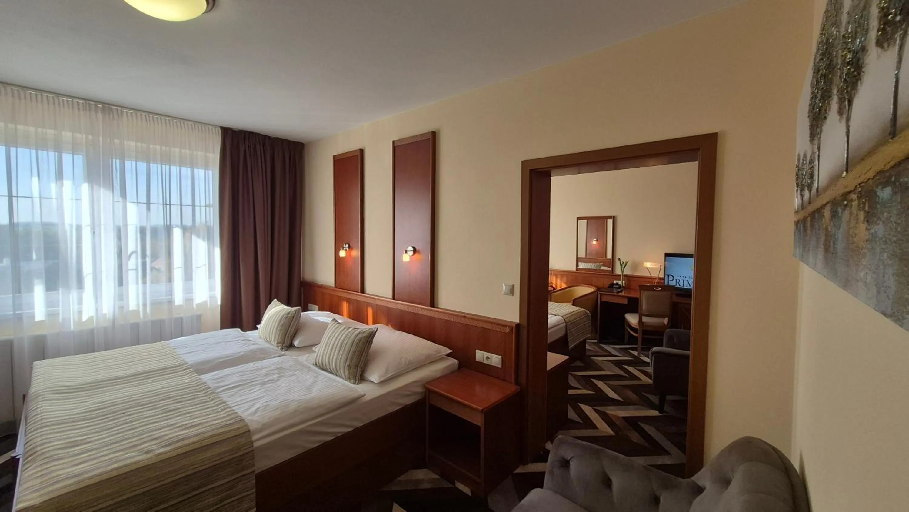 Bed in PRIMAVERA Hotel & Congress centre