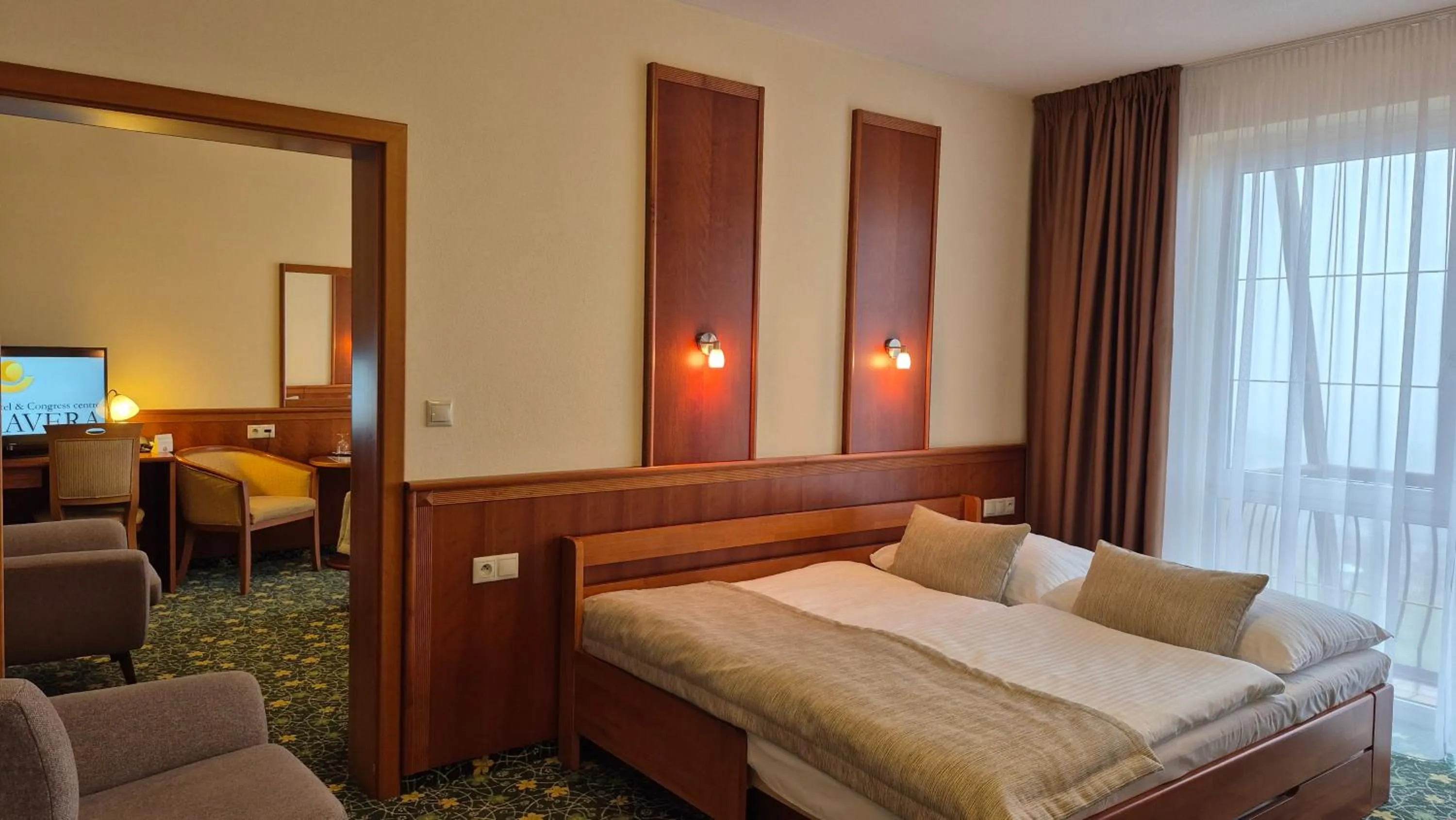 Bed in PRIMAVERA Hotel & Congress centre