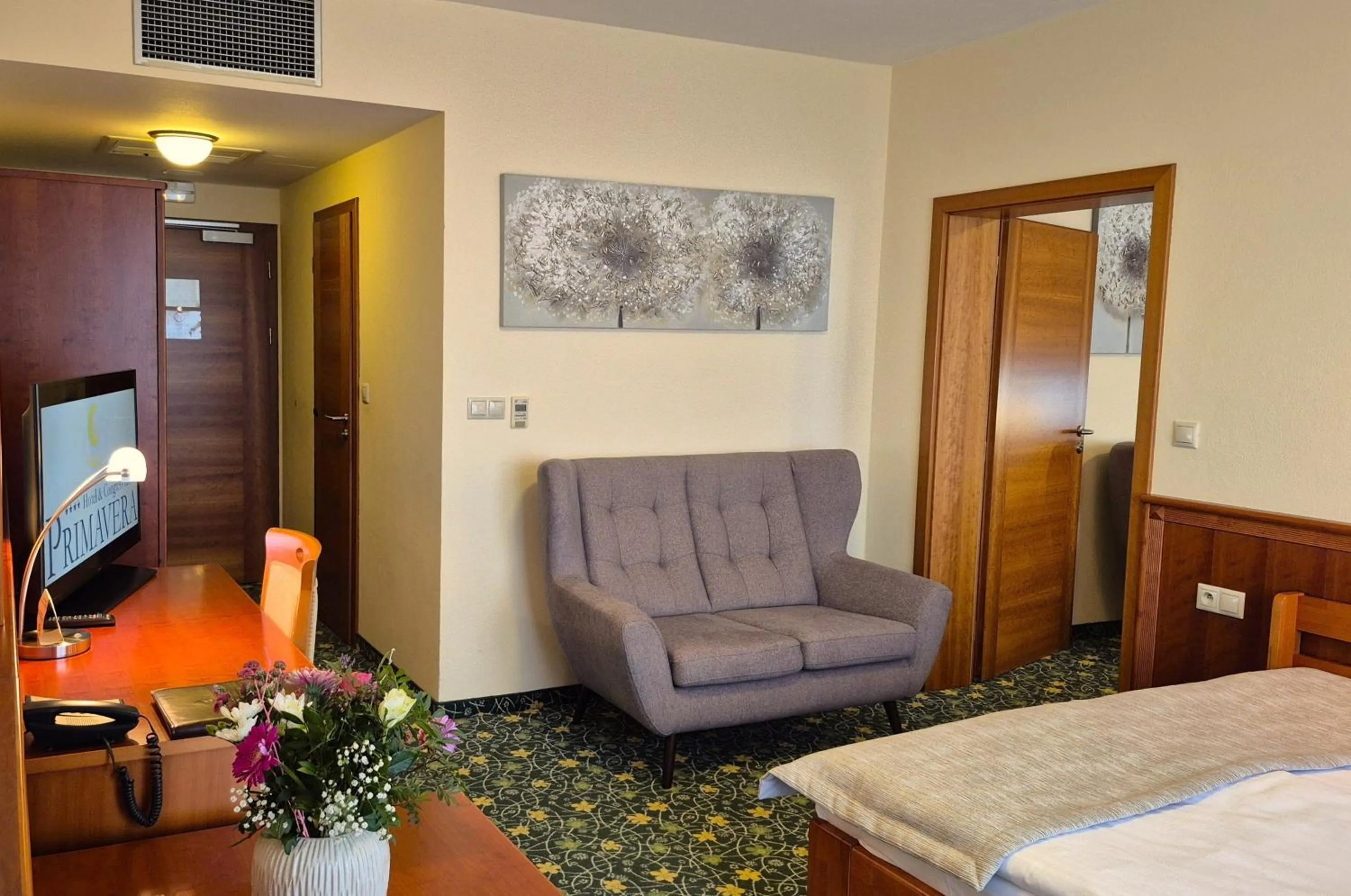 Bed in PRIMAVERA Hotel & Congress centre