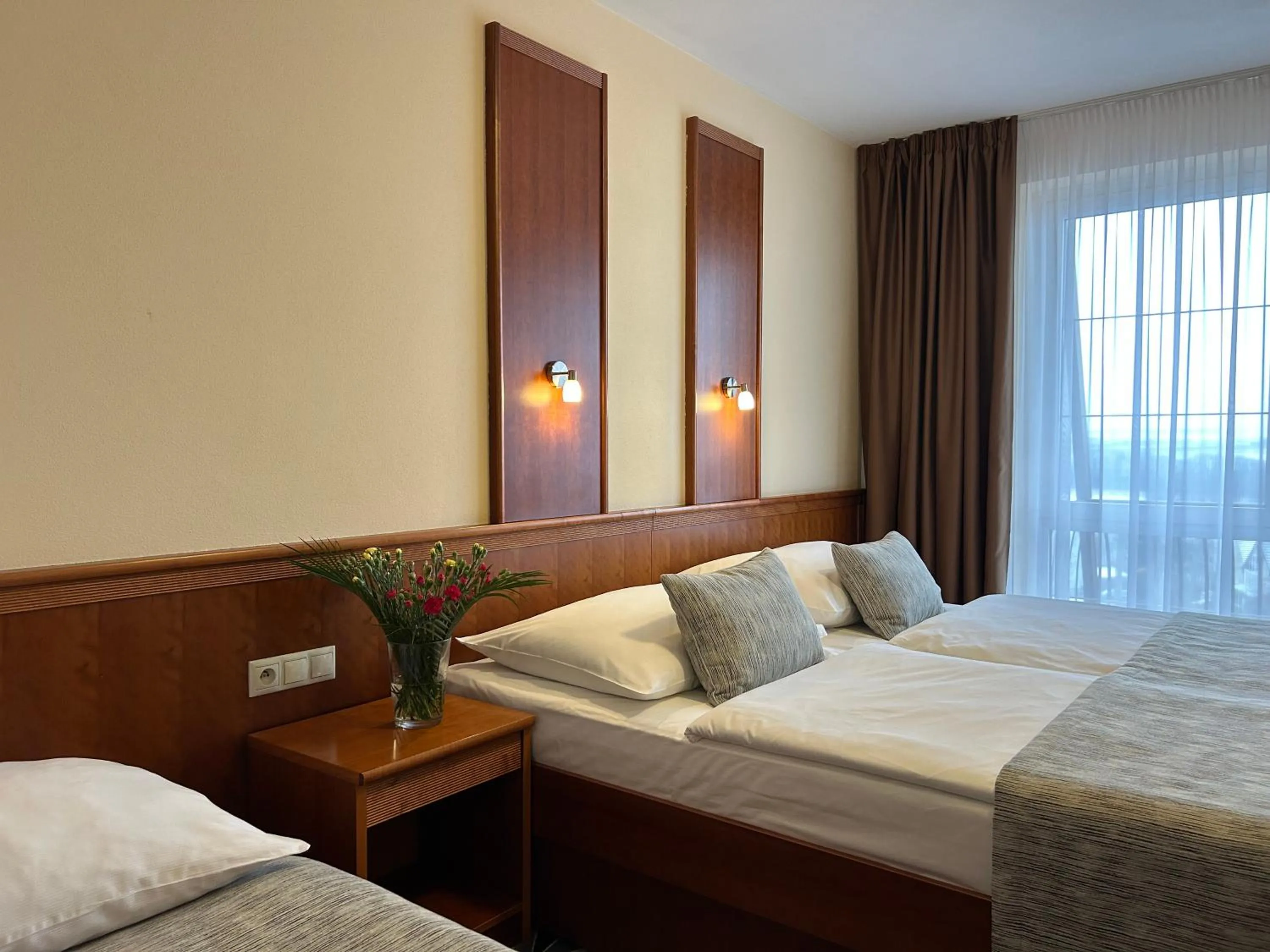 Bed in PRIMAVERA Hotel & Congress centre