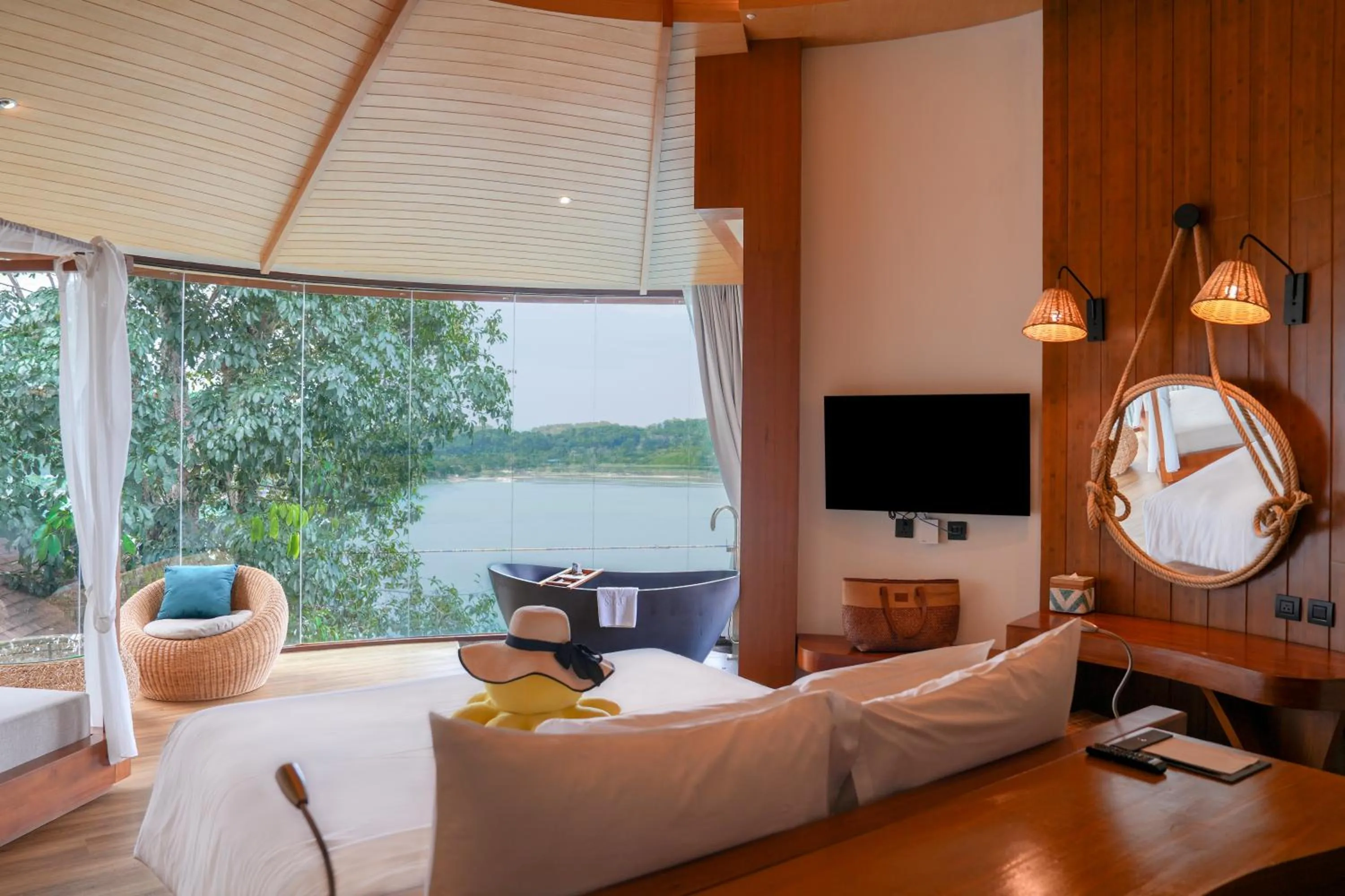 Bed in SINAE Phuket Luxury Hotel