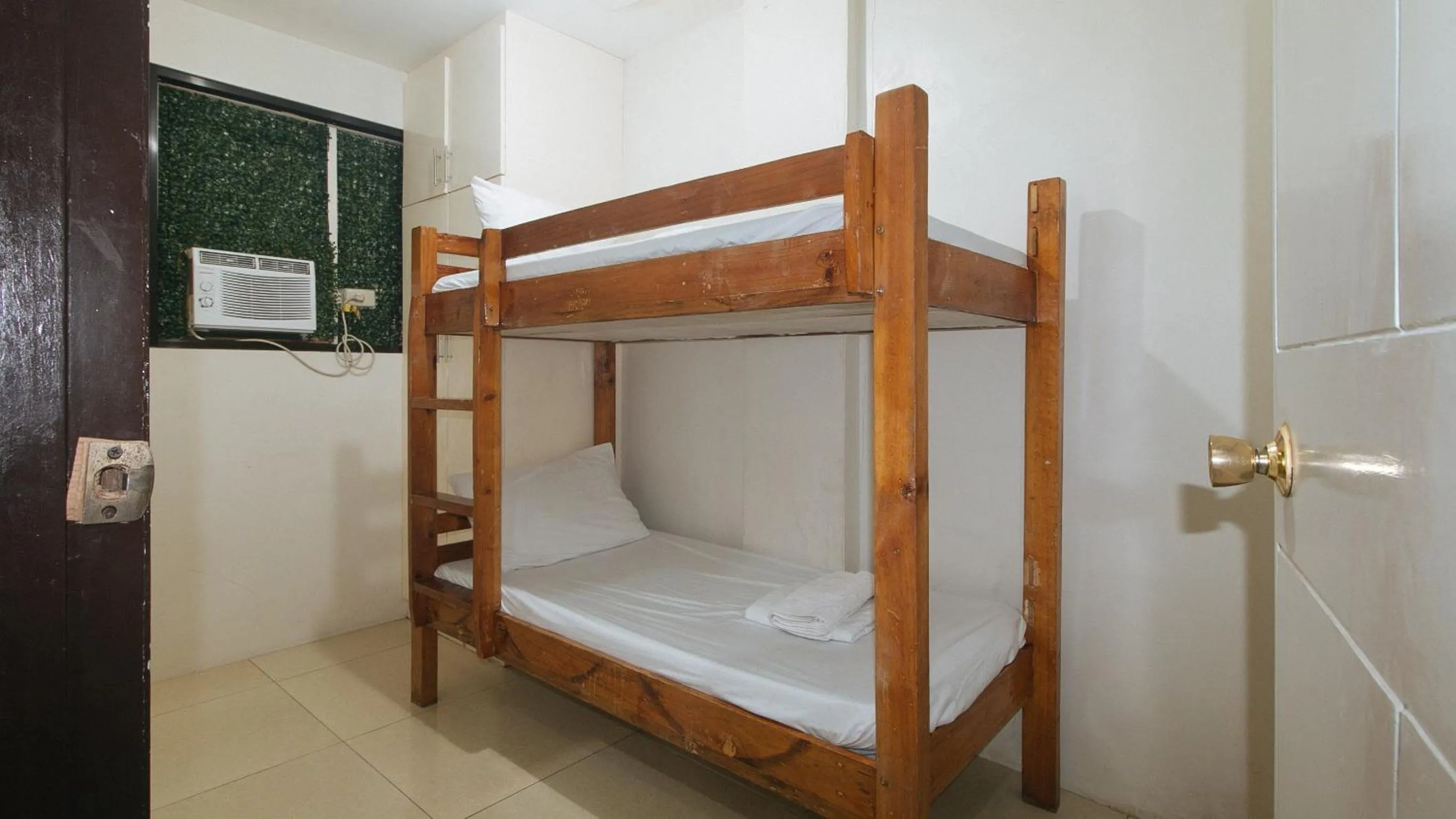 Bedroom, Bed in Nearest Hostel Pasay City by RedDoorz