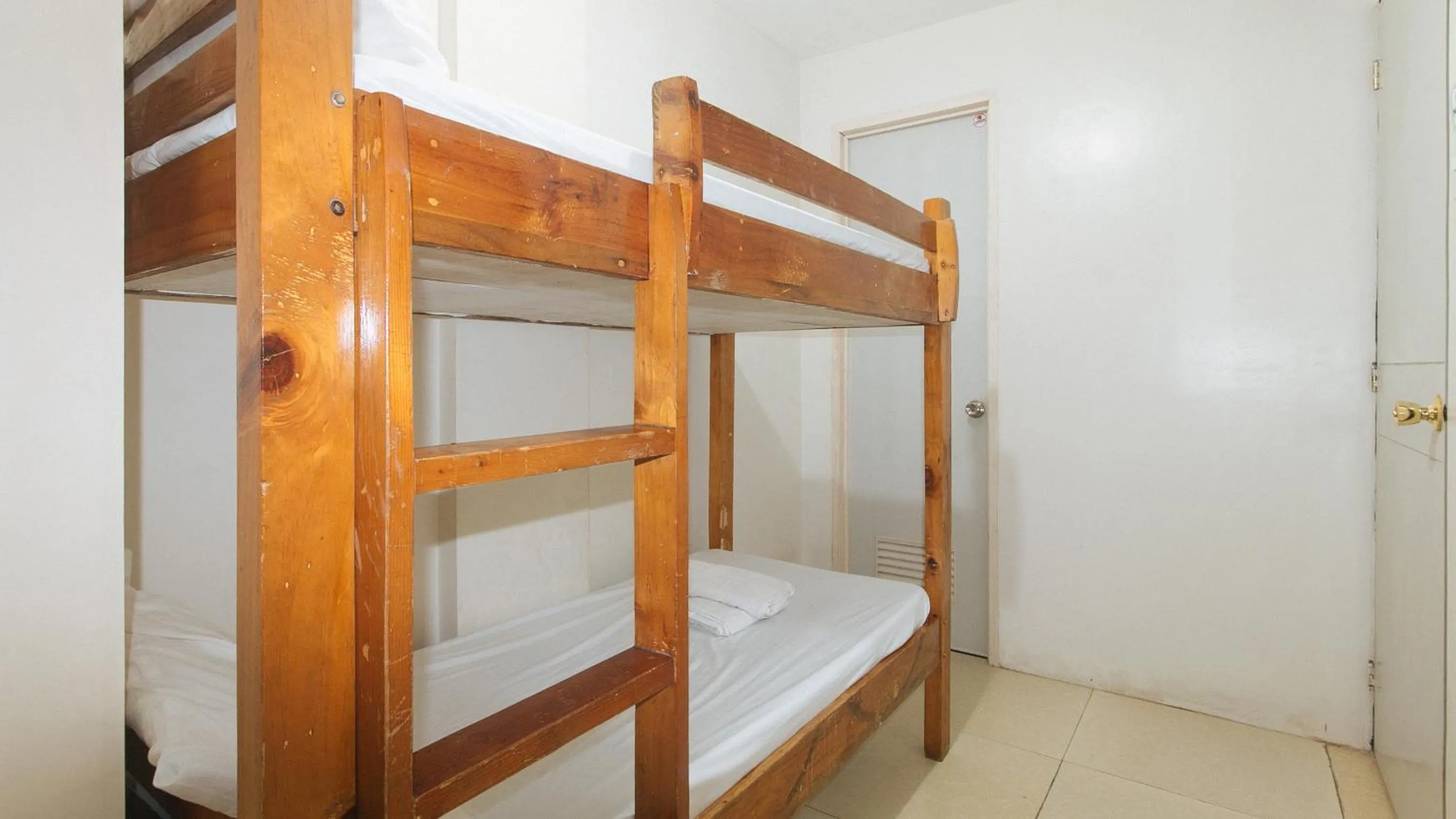 Bedroom, Bed in Nearest Hostel Pasay City by RedDoorz