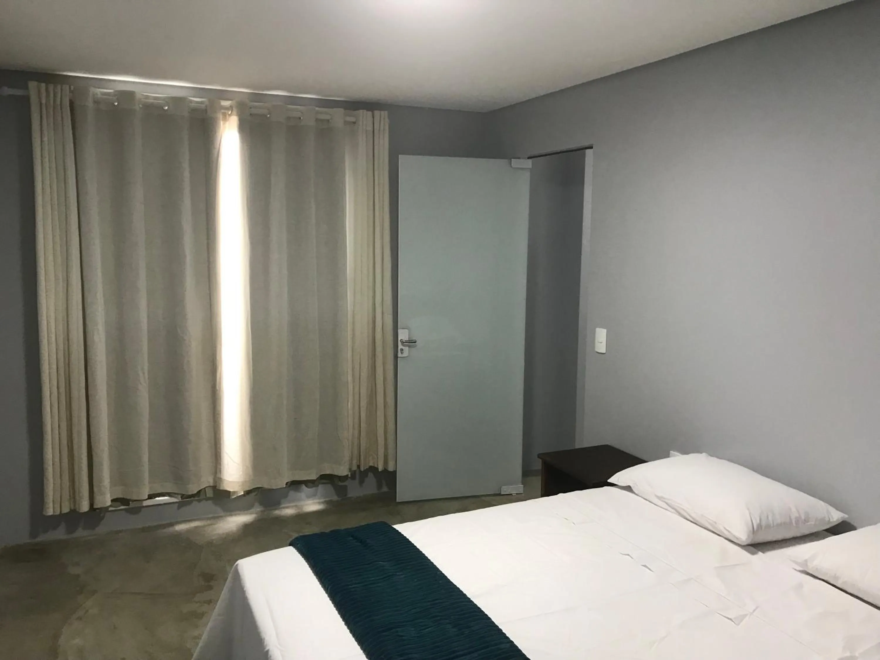 Bed in Pousada Ohana Dullius