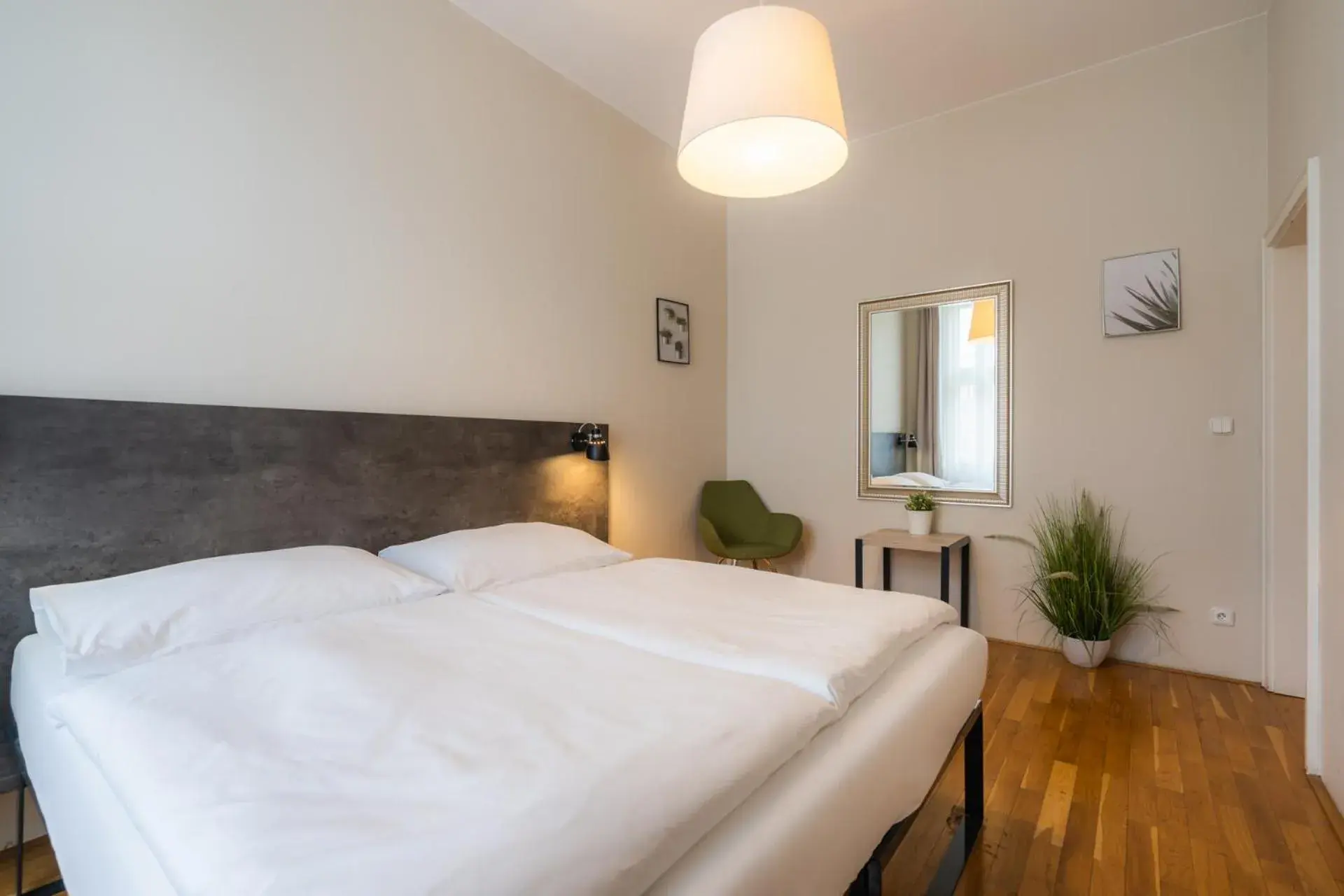 Bed in EA ApartHotel Melantrich Bed in EA ApartHotel Melantrich