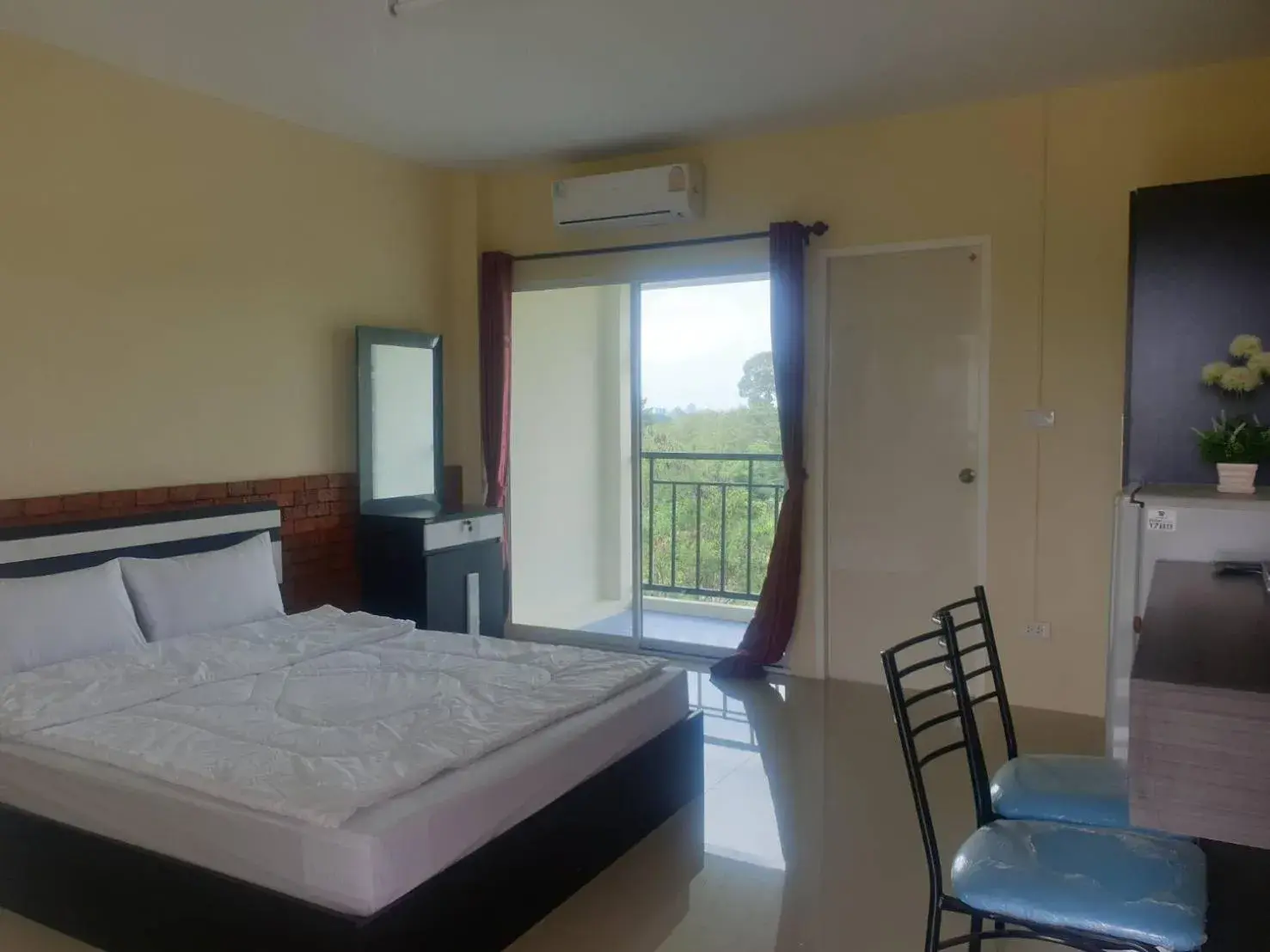 Photo of the whole room, Bed in Ek Residence Banchang City Photo of the whole room, Bed in Ek Residence Banchang City