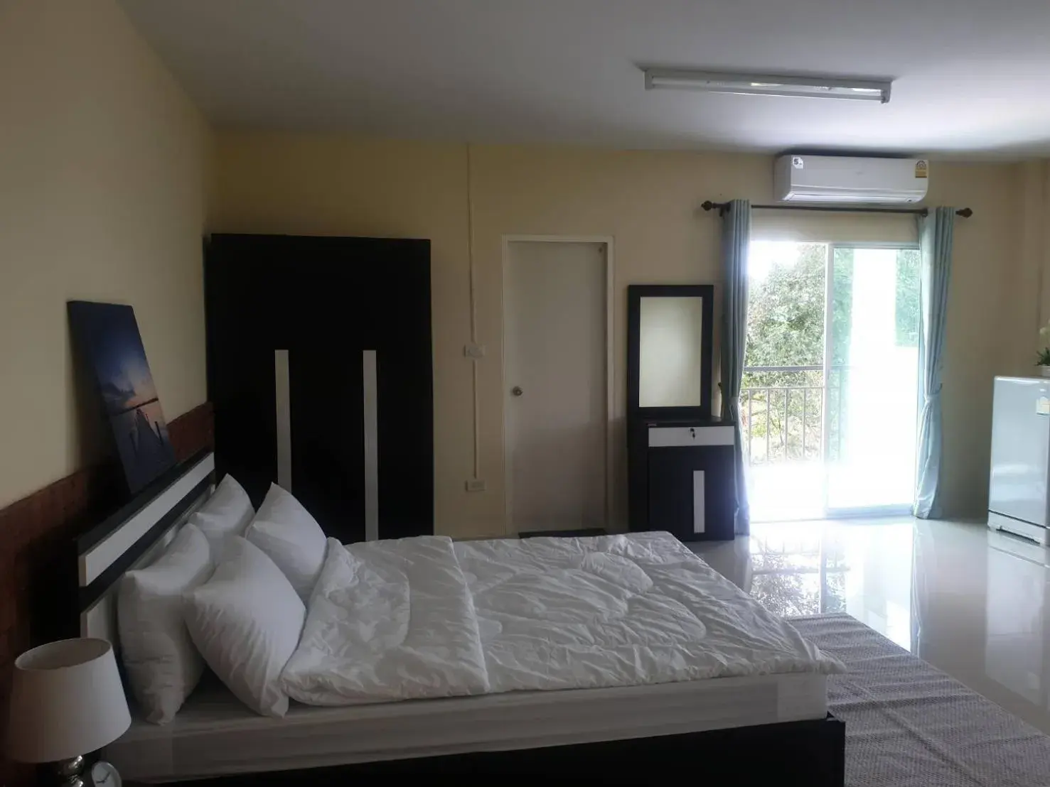 Photo of the whole room, Bed in Ek Residence Banchang City Photo of the whole room, Bed in Ek Residence Banchang City