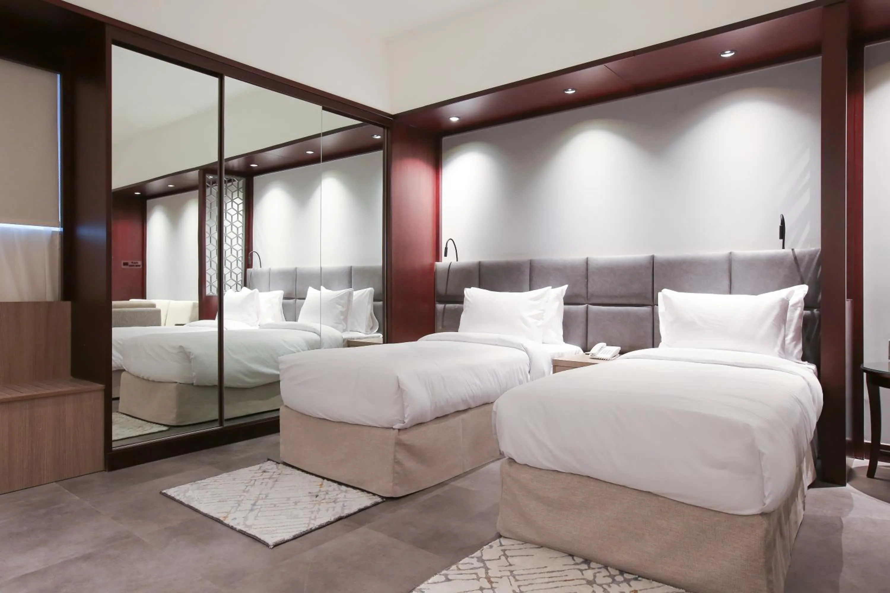 Bed in SITARA HOTEL APARTMENT