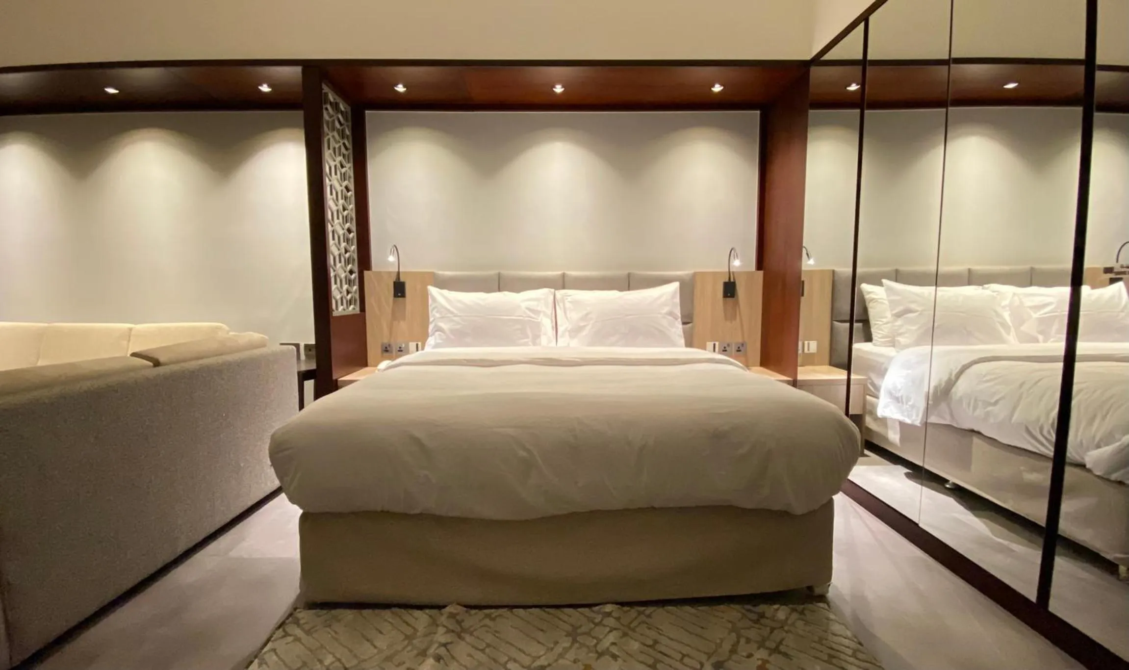 Bed in SITARA HOTEL APARTMENT