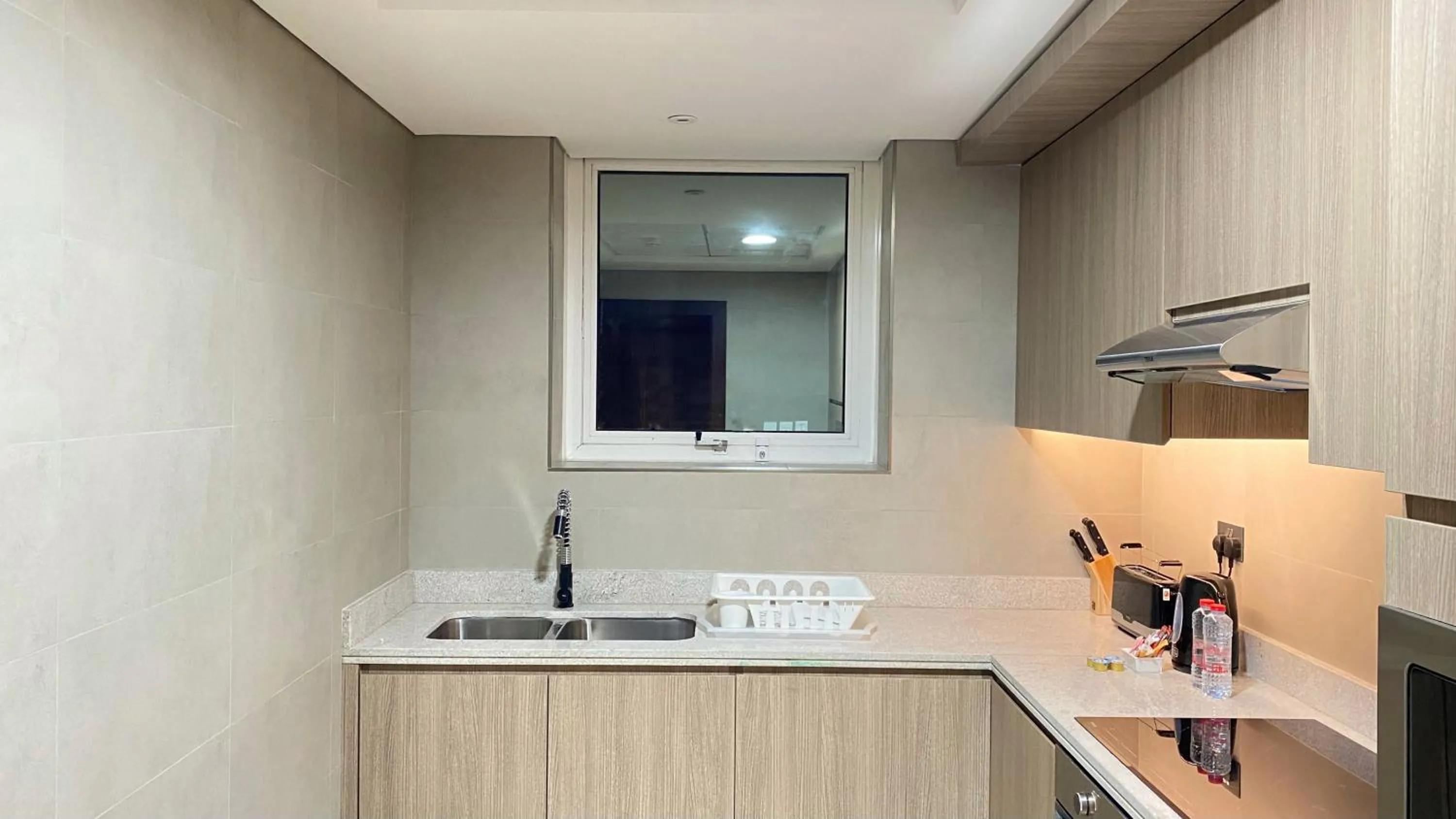 Kitchen or kitchenette in SITARA HOTEL APARTMENT