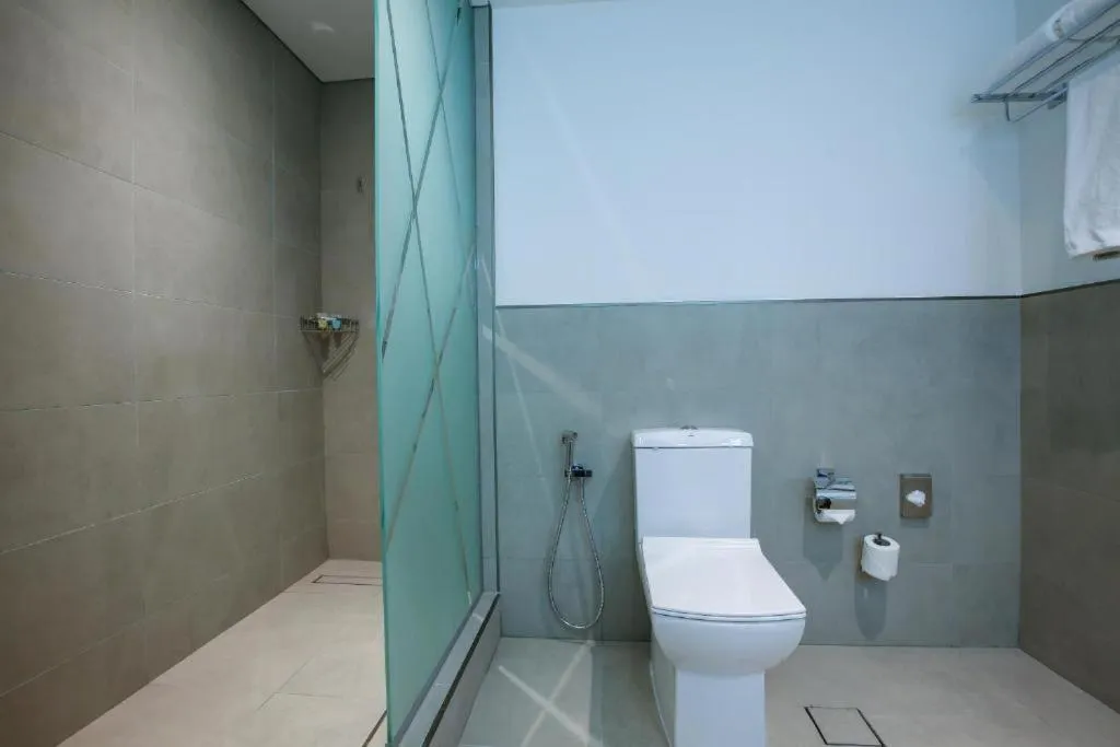 Toilet in SITARA HOTEL APARTMENT