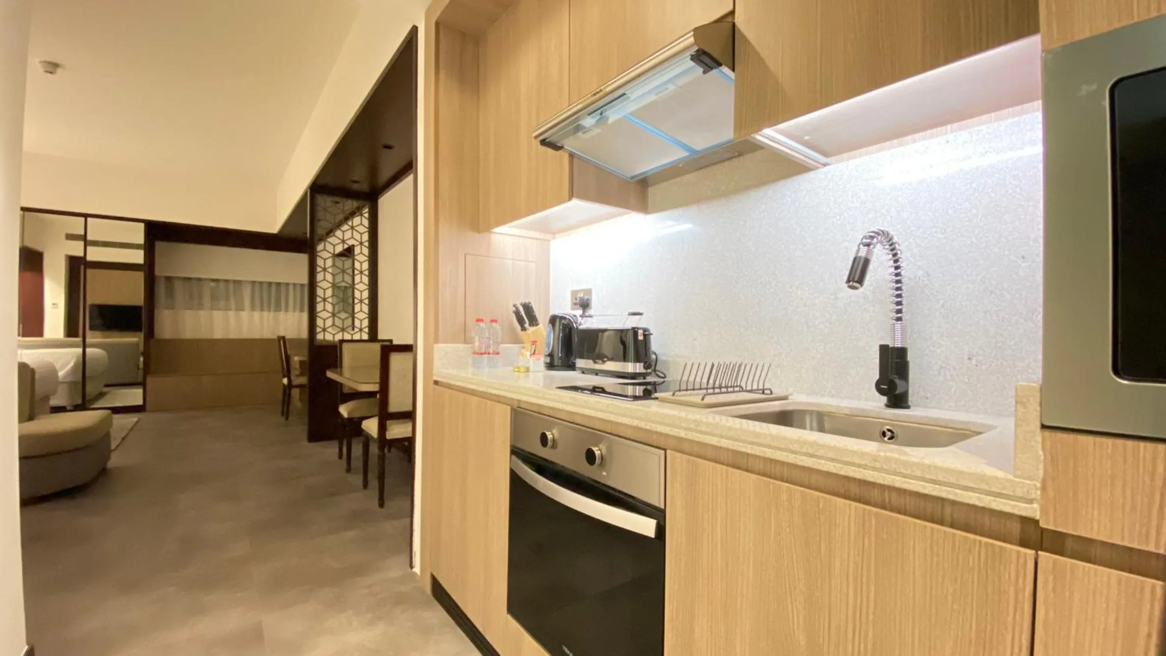 Kitchen or kitchenette in SITARA HOTEL APARTMENT