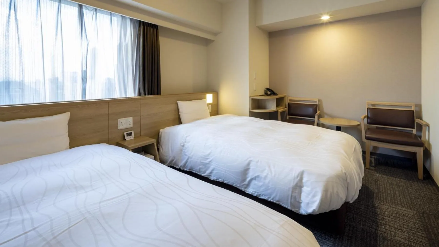 Bed in Dormy Inn Hiroshima Annex