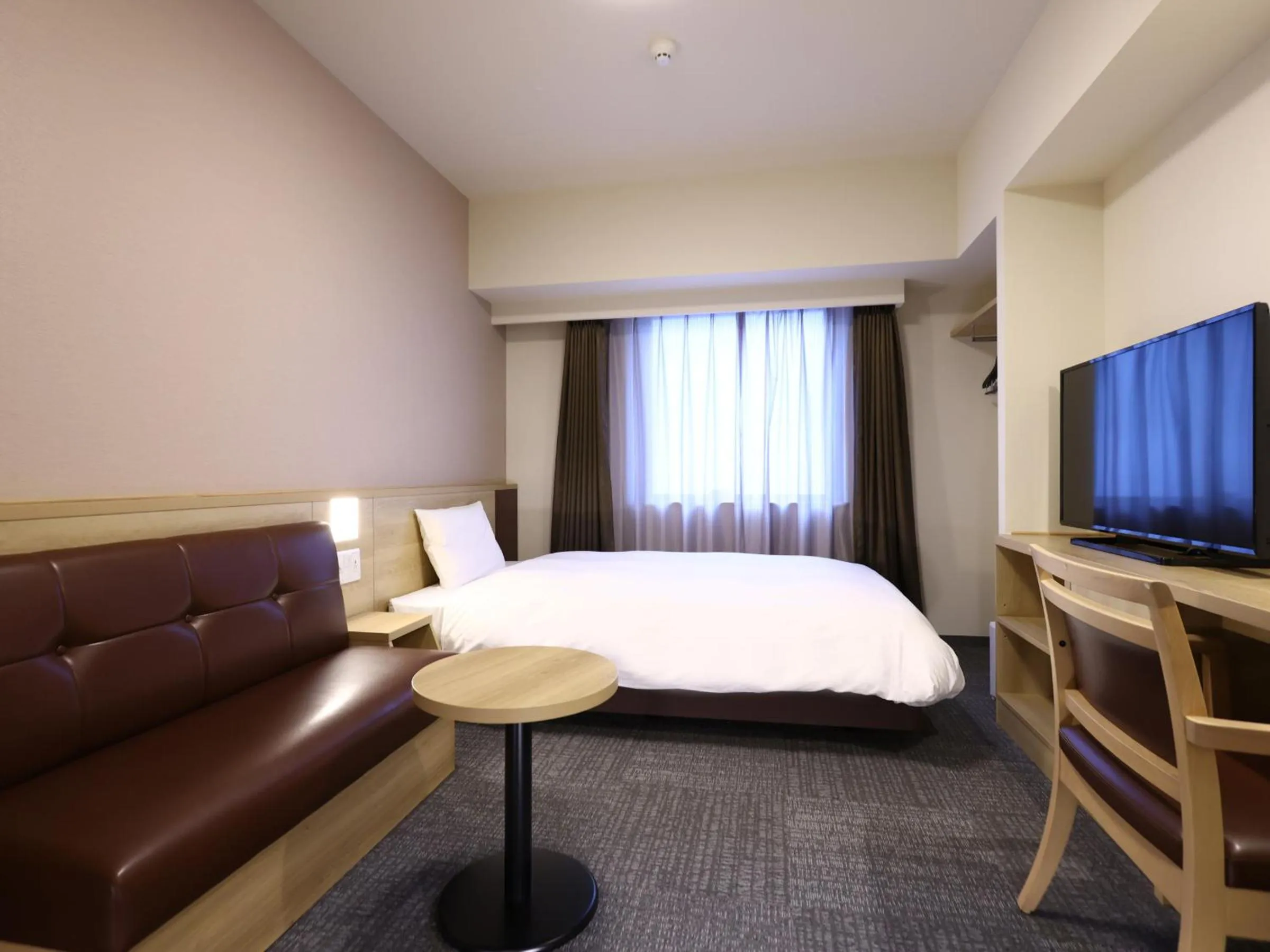 Bed in Dormy Inn Hiroshima Annex