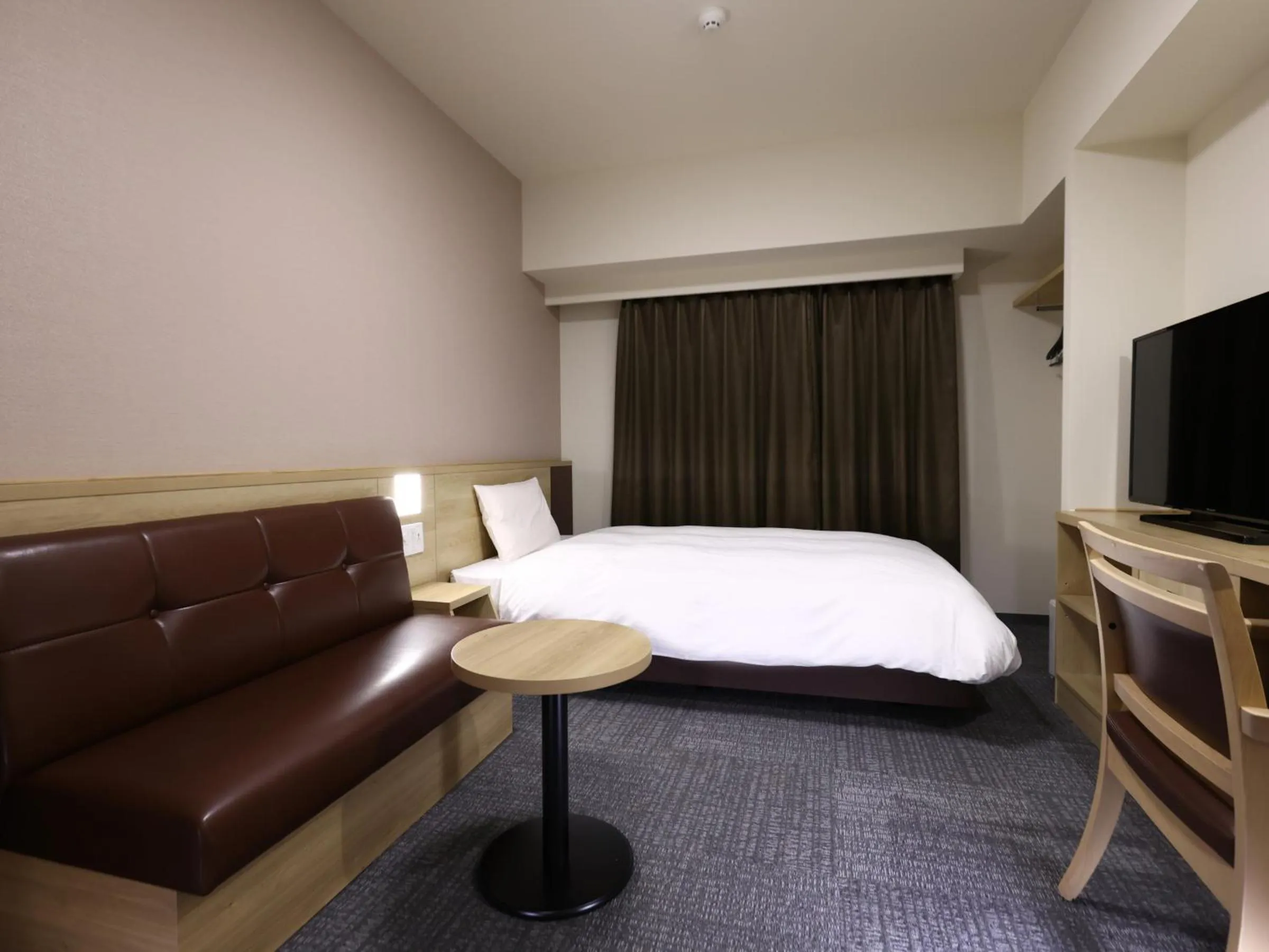 Bed in Dormy Inn Hiroshima Annex