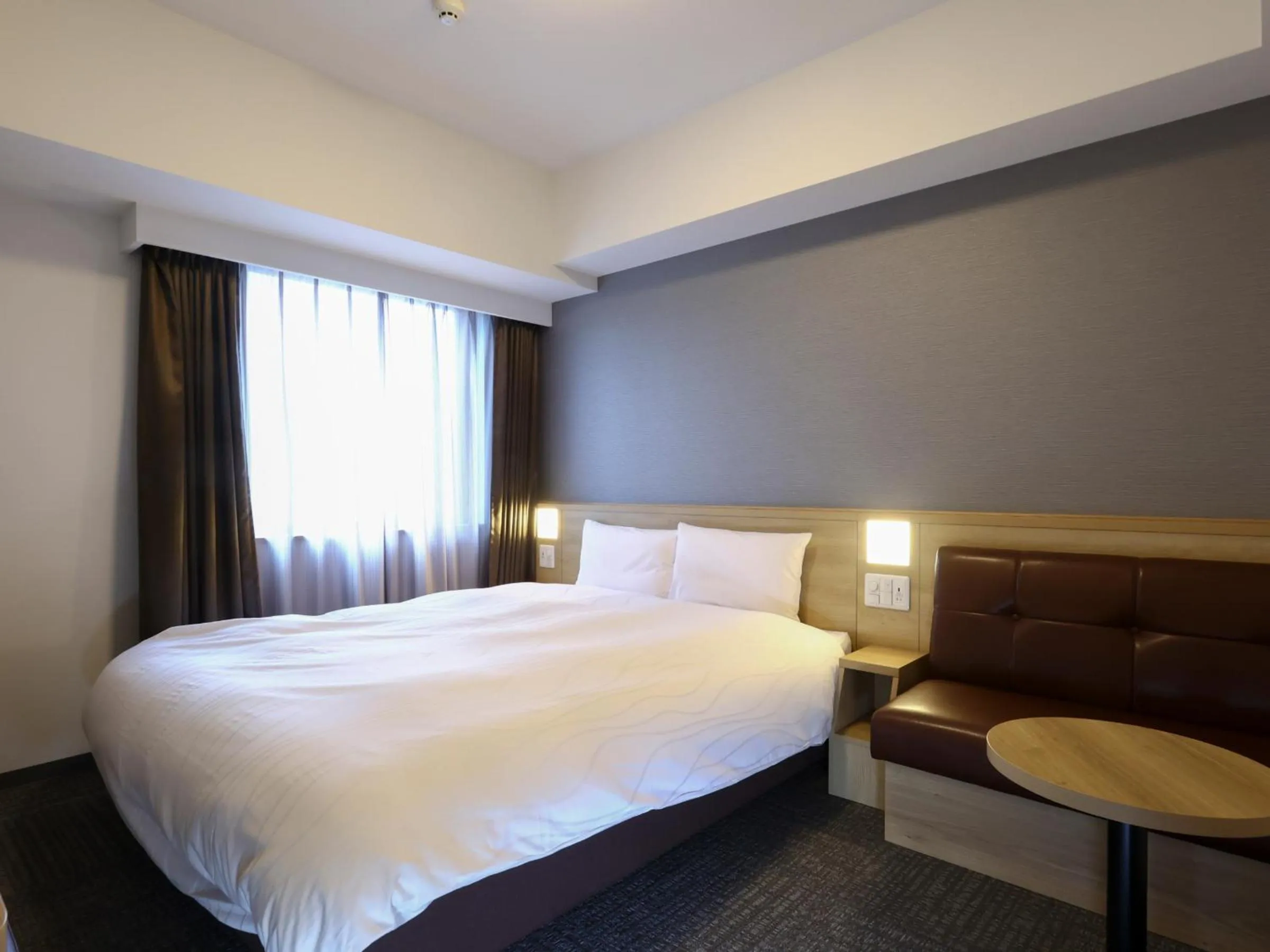 Bed in Dormy Inn Hiroshima Annex