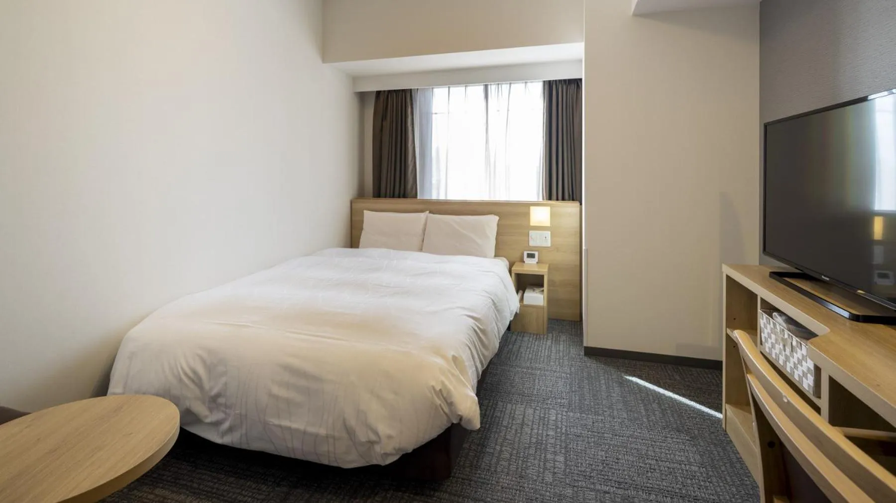 Bed in Dormy Inn Hiroshima Annex