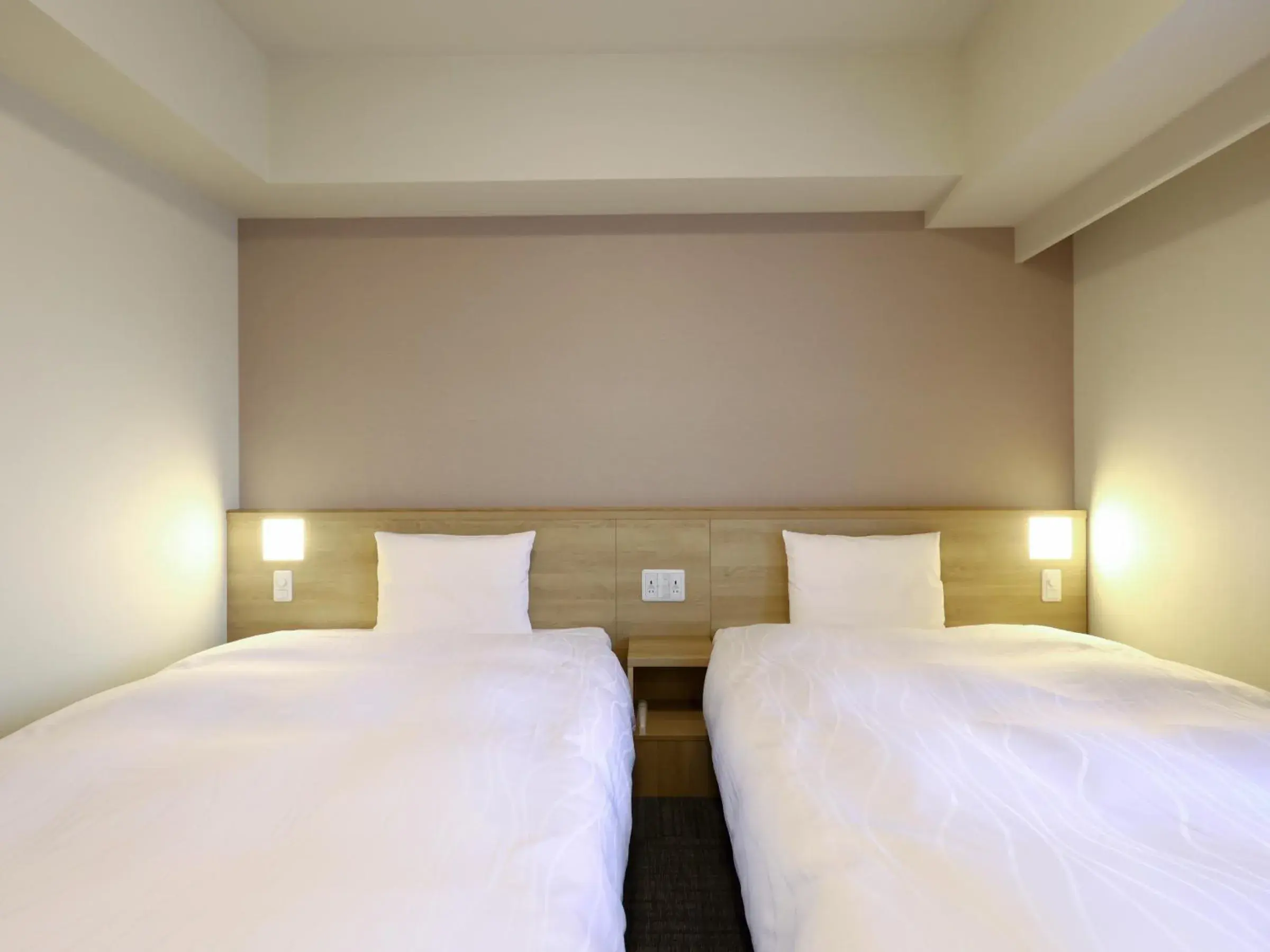 Bed in Dormy Inn Hiroshima Annex Bed in Dormy Inn Hiroshima Annex