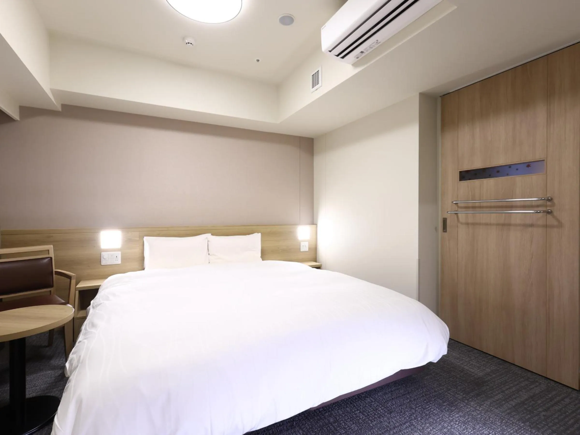 Bed in Dormy Inn Hiroshima Annex