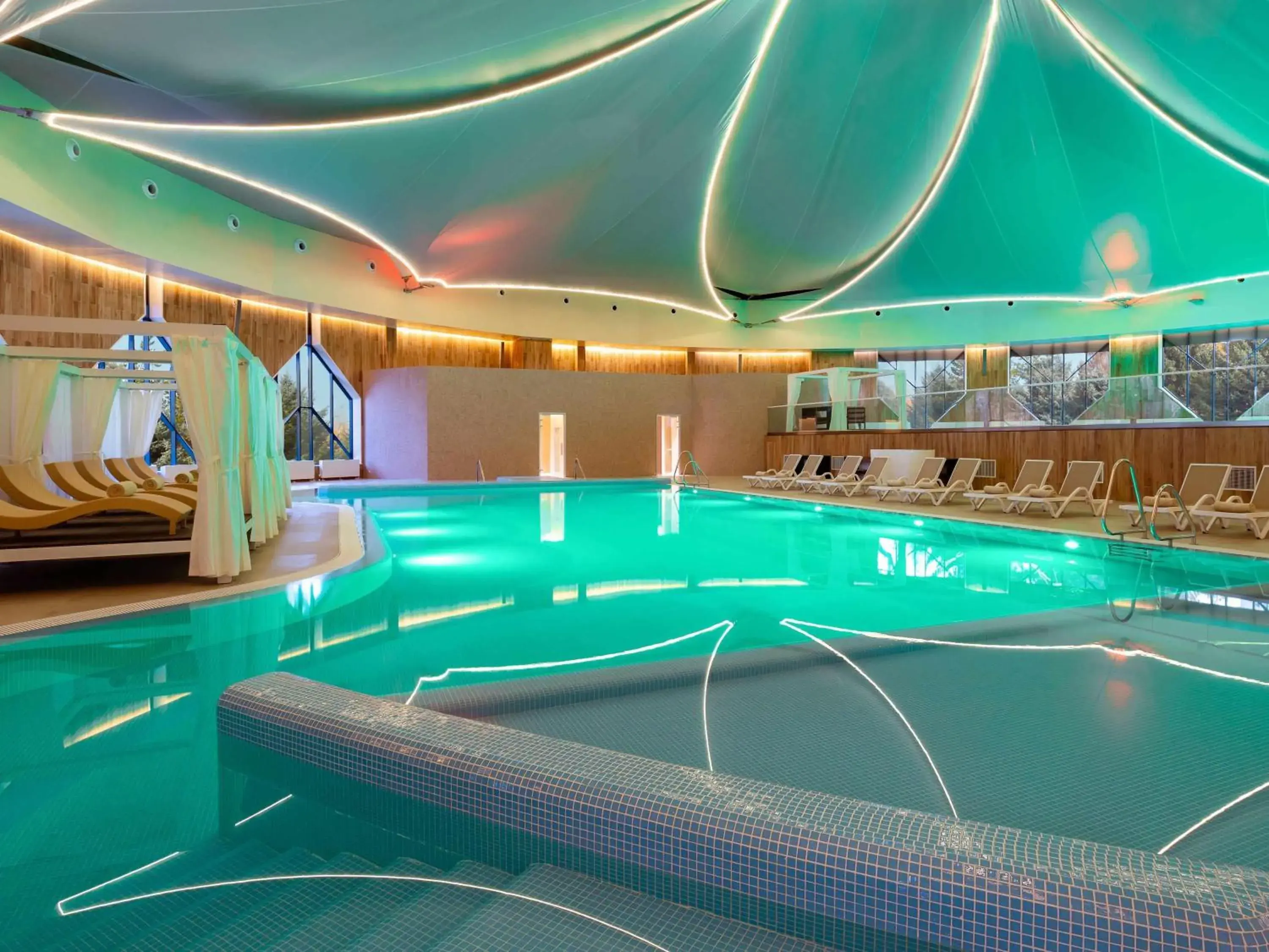 Pool view in Swissôtel Wellness Resort Alatau Almaty Pool view in Swissôtel Wellness Resort Alatau Almaty