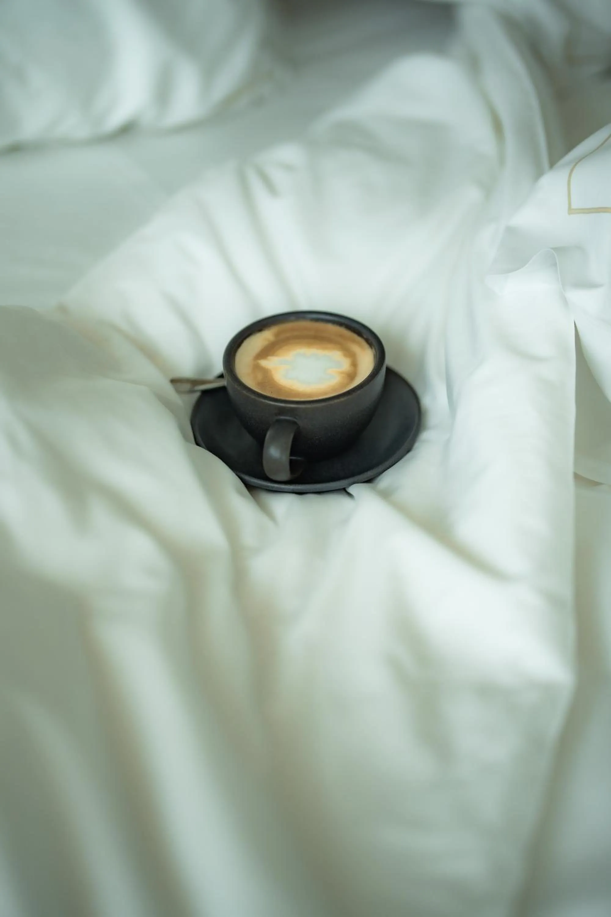 Bed in Hôtel des Horlogers