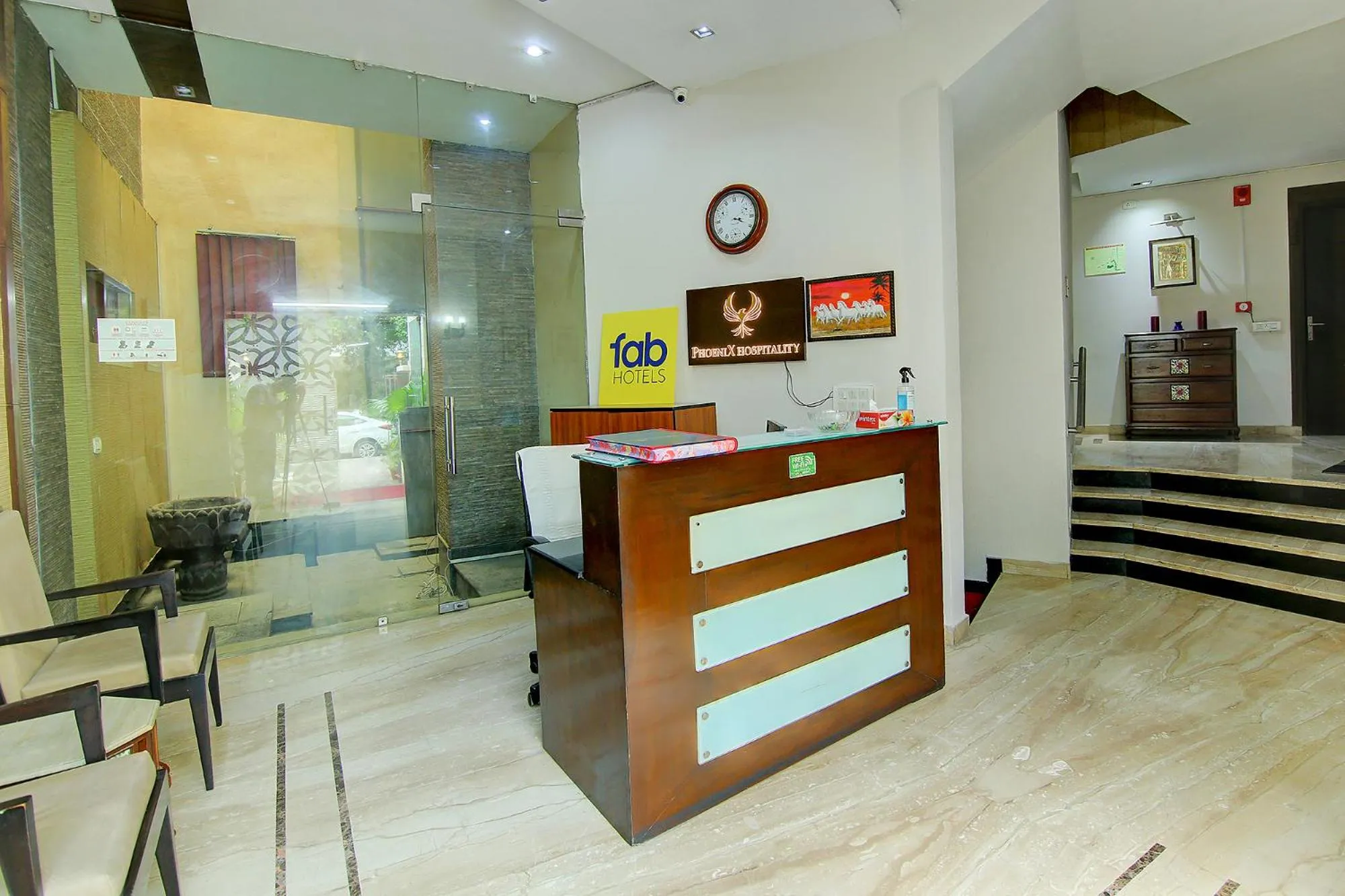 Lobby or reception in FabHotel Phoenix Hospitality Near DLF Cyber Hub & Metro, Gurugram